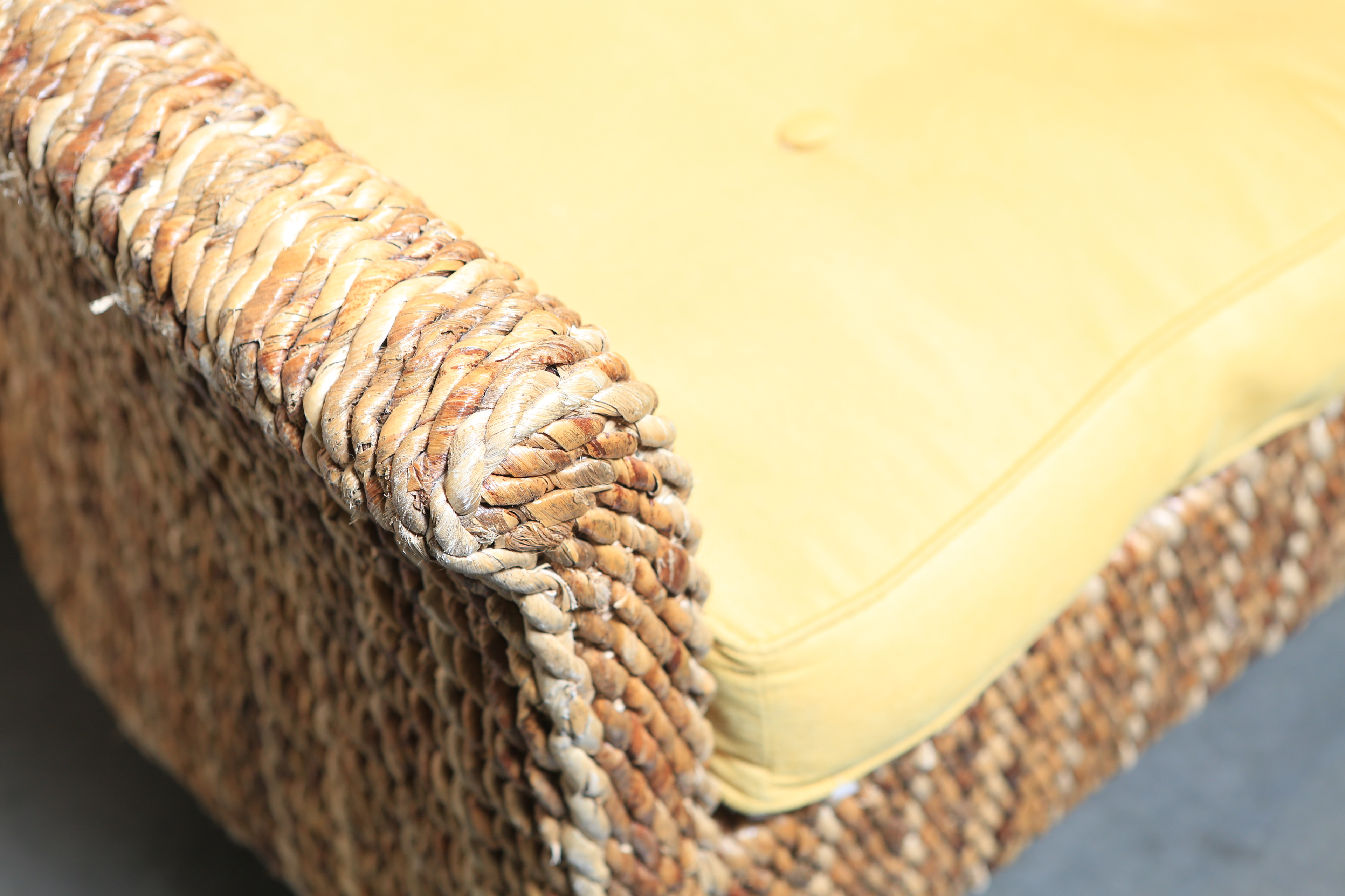 Wicker Bench with Yellow Upholstered Seat Cushion