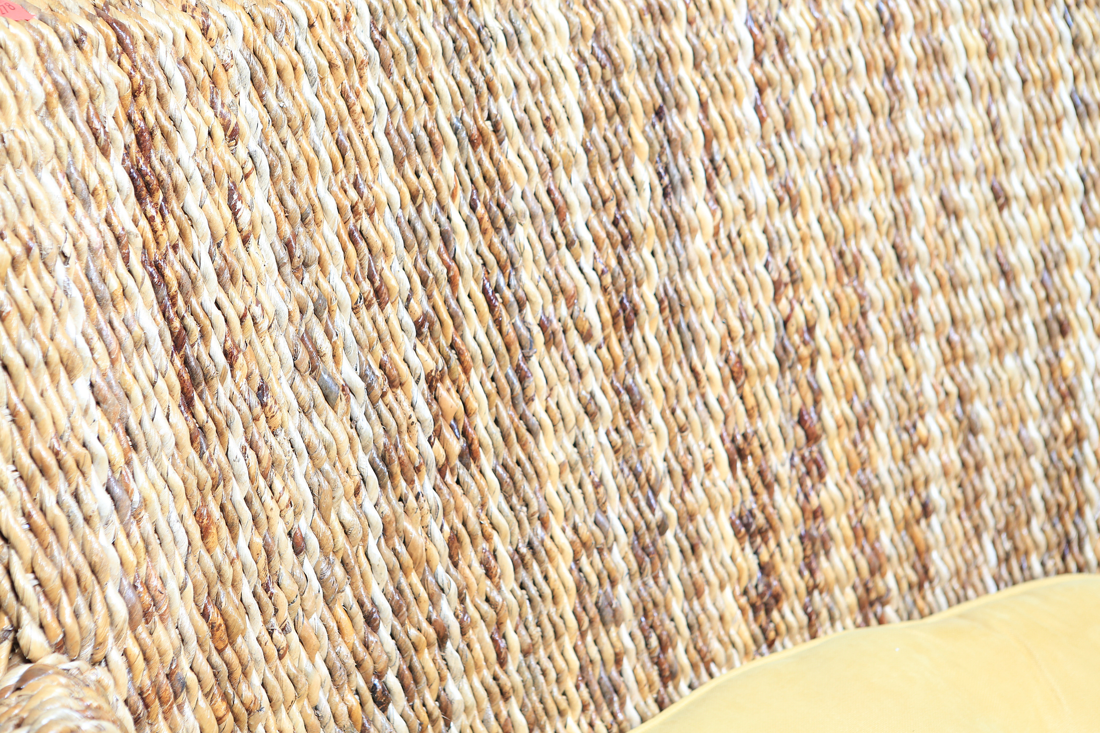 Wicker Bench with Yellow Upholstered Seat Cushion