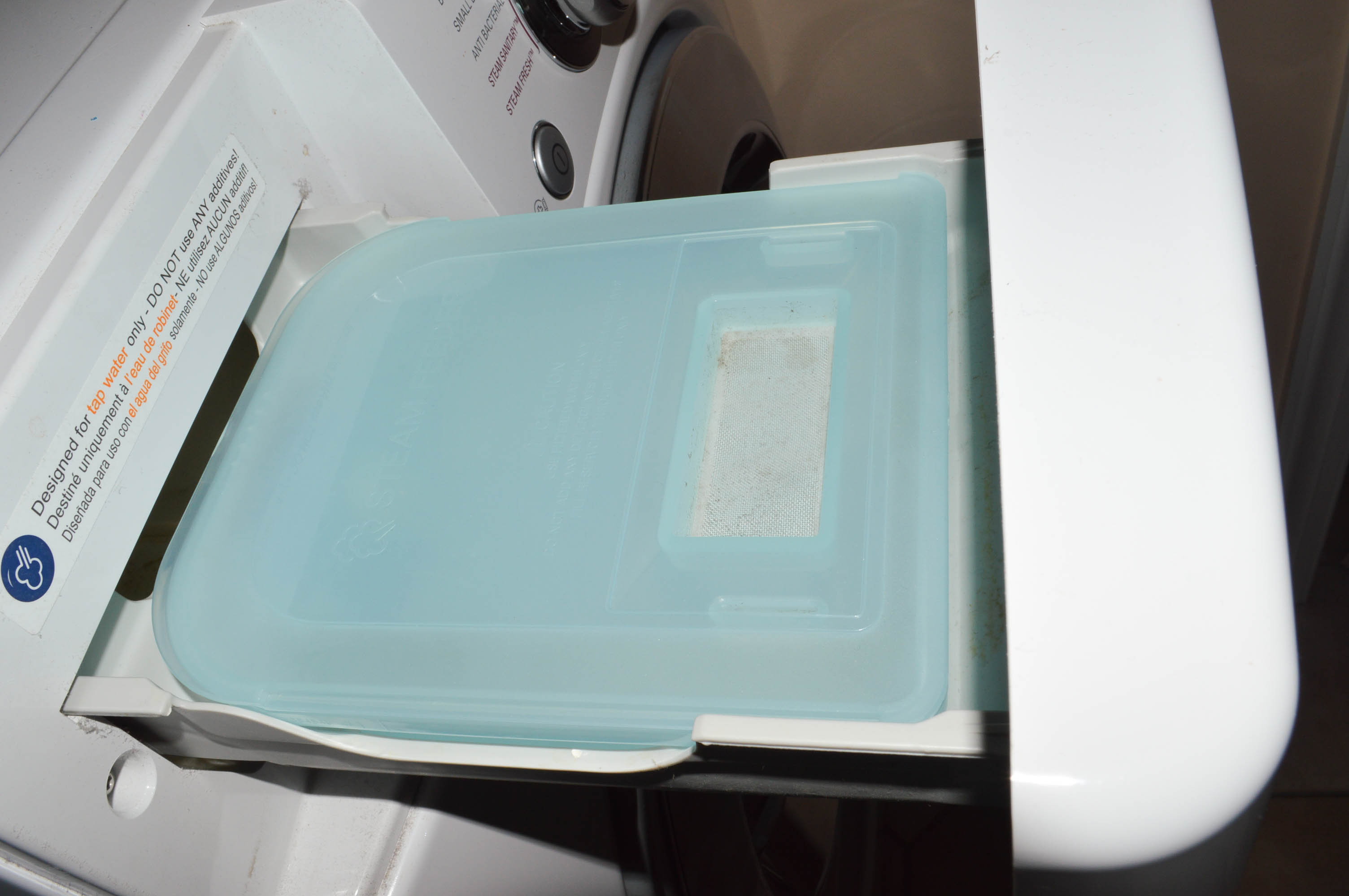 LG TrueSteam Electric Dryer with Pedestal Base