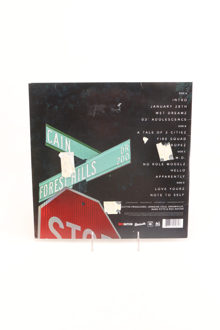 Kendrick Lamar "Pimp a Butterfly" and J Cole "Forest Hill" LPs