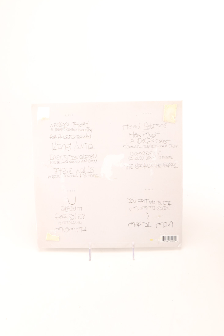 Kendrick Lamar "Pimp a Butterfly" and J Cole "Forest Hill" LPs