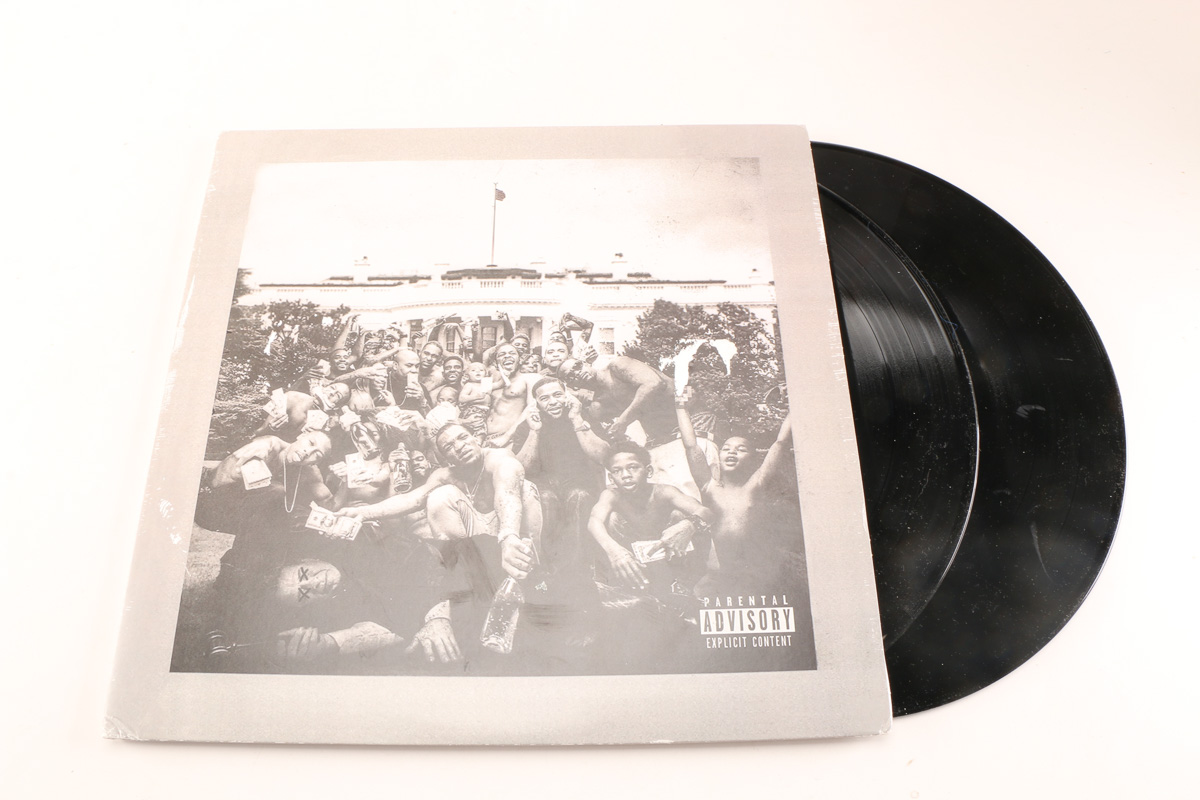 Kendrick Lamar "Pimp a Butterfly" and J Cole "Forest Hill" LPs