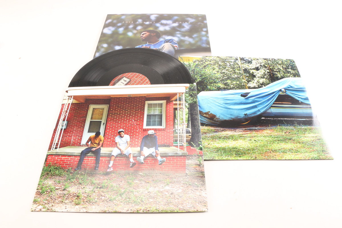 Kendrick Lamar "Pimp a Butterfly" and J Cole "Forest Hill" LPs