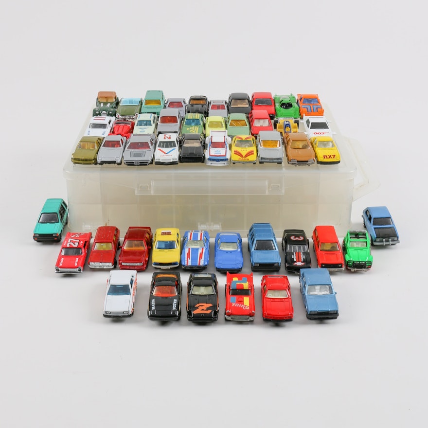 Forty-Eight 1:64 Scale Die-Cast Cars