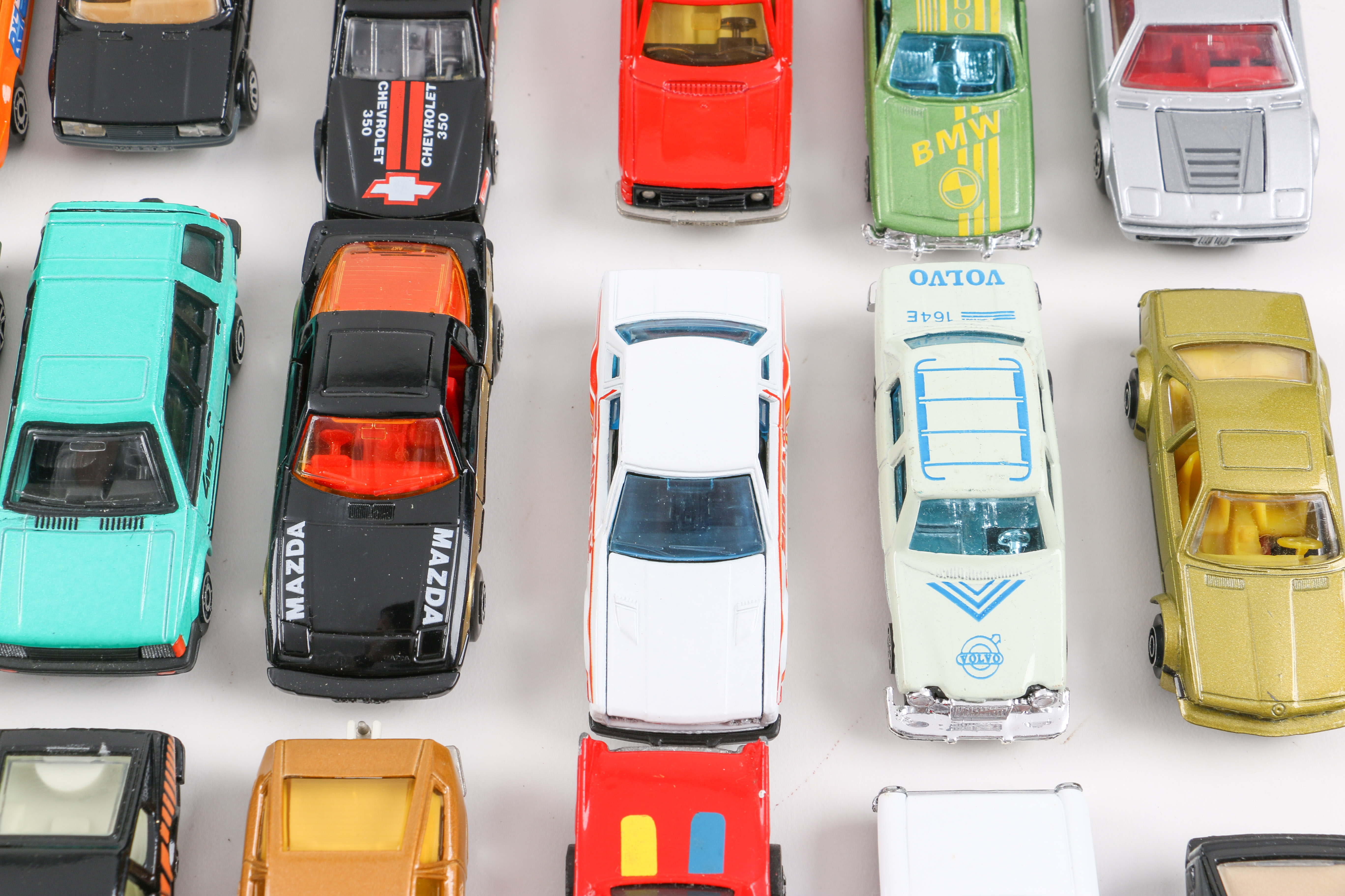 Forty-Eight 1:64 Scale Die-Cast Cars