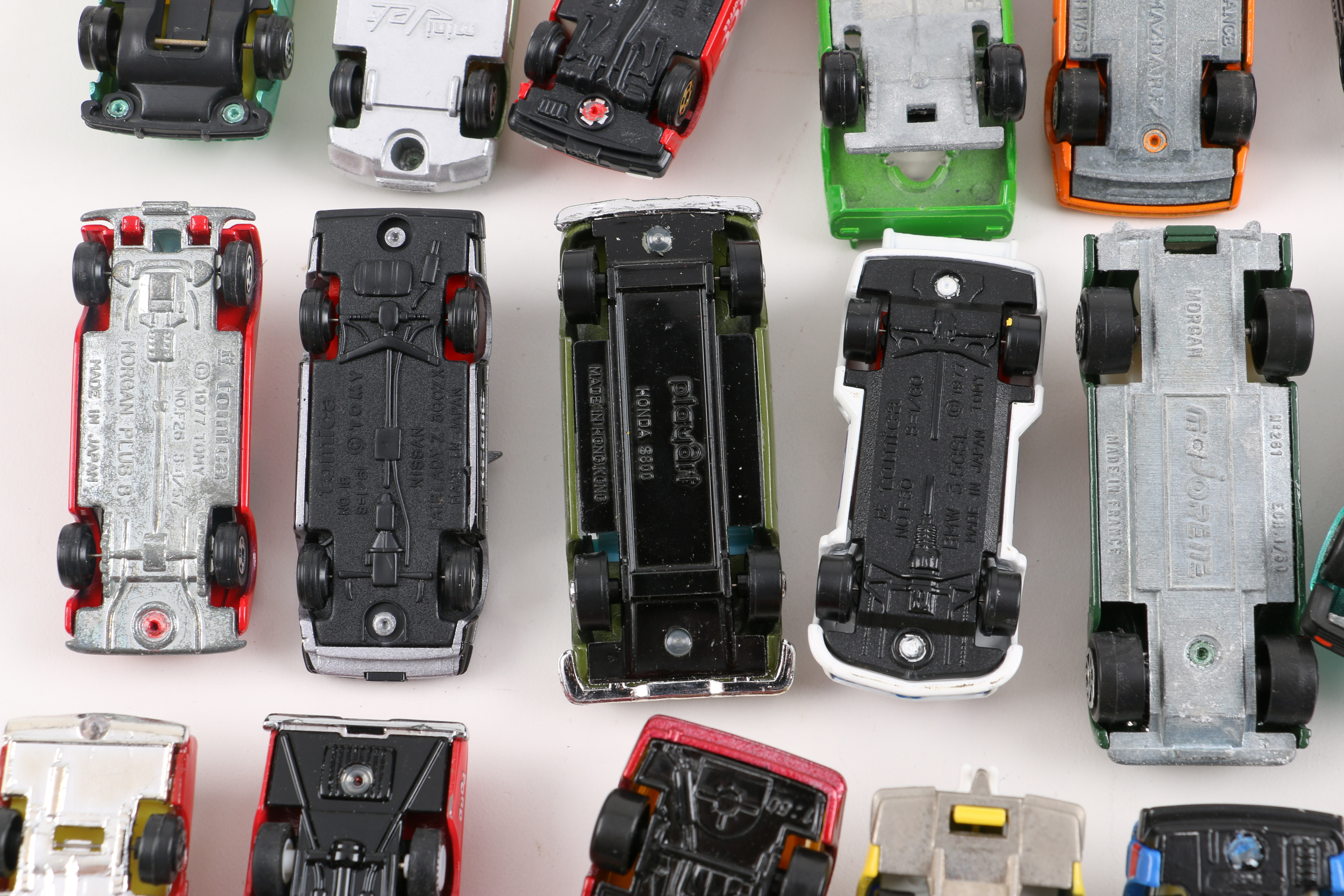 Forty-Eight 1:64 Scale Die-Cast Cars