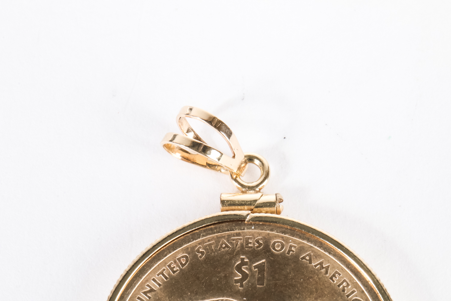 U.S. One Dollar Sacagawea Coin in a Gold Filled Pendant Setting