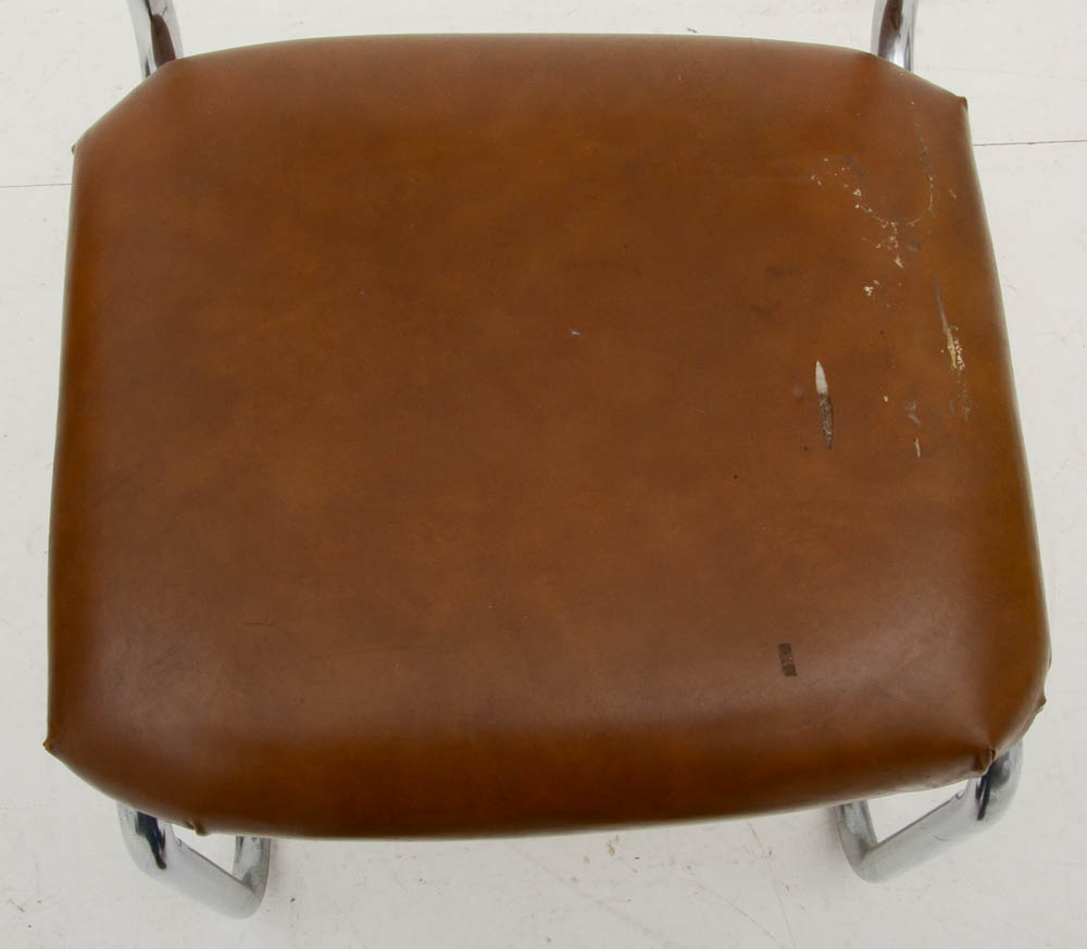 Three Cantilevered Side Chairs with Woven Cane Backs