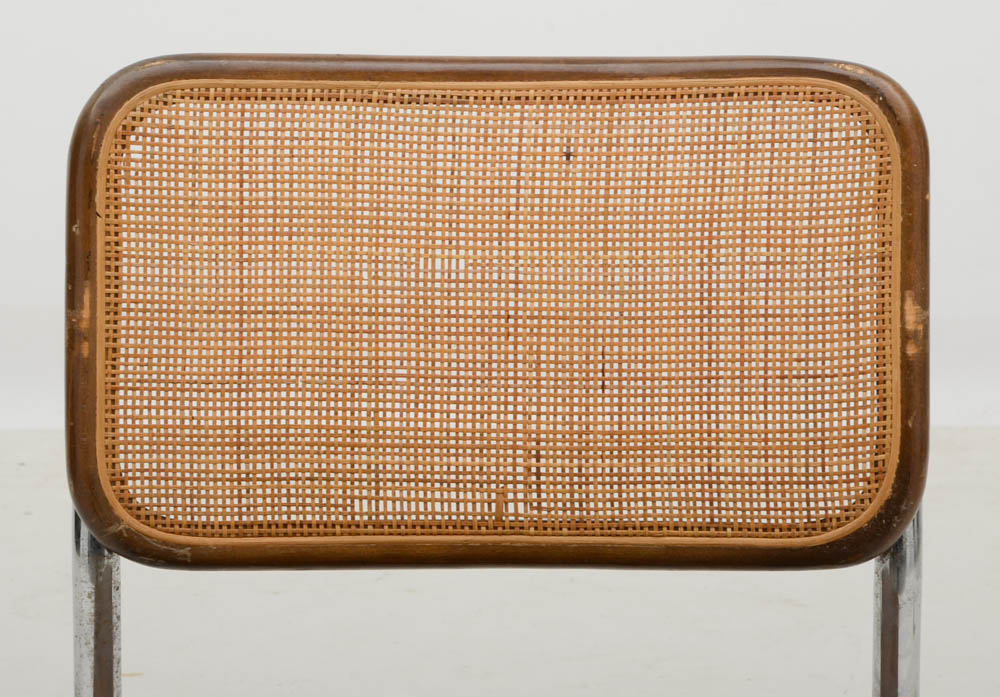 Three Cantilevered Side Chairs with Woven Cane Backs