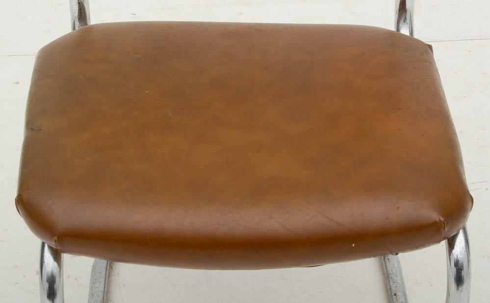 Three Cantilevered Side Chairs with Woven Cane Backs