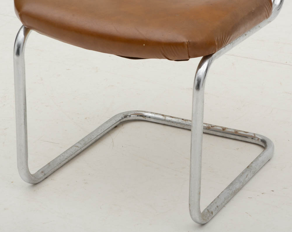 Three Cantilevered Side Chairs with Woven Cane Backs