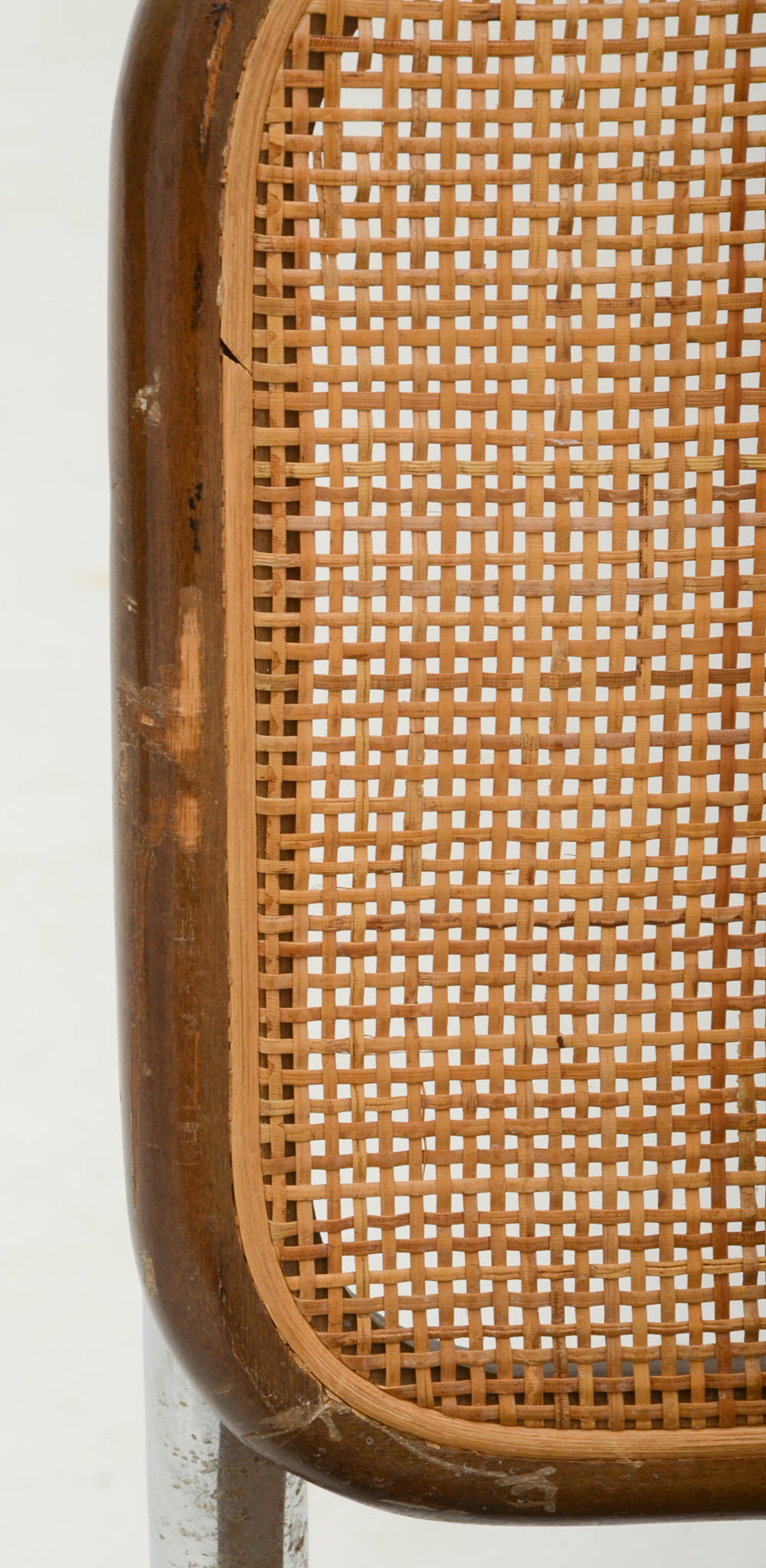 Three Cantilevered Side Chairs with Woven Cane Backs