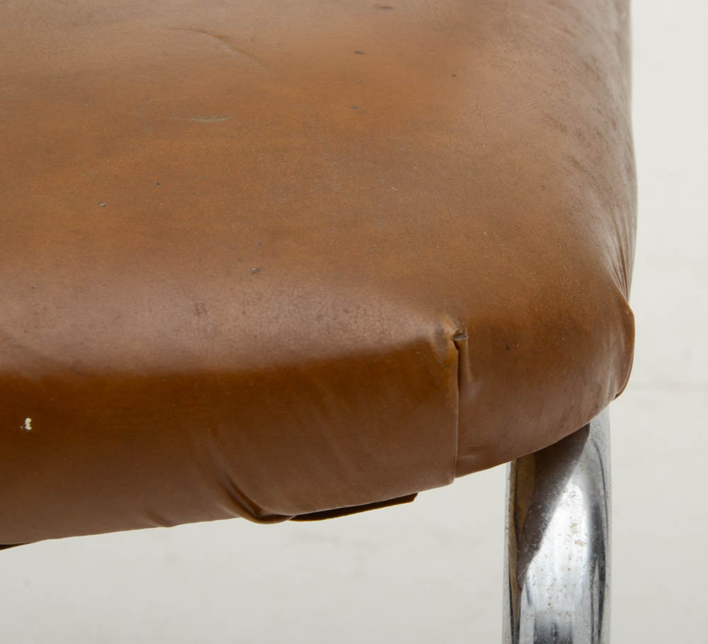 Three Cantilevered Side Chairs with Woven Cane Backs