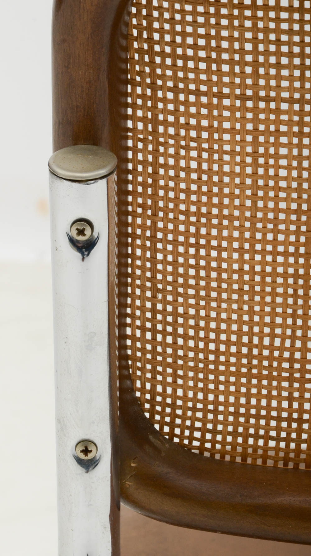 Three Cantilevered Side Chairs with Woven Cane Backs