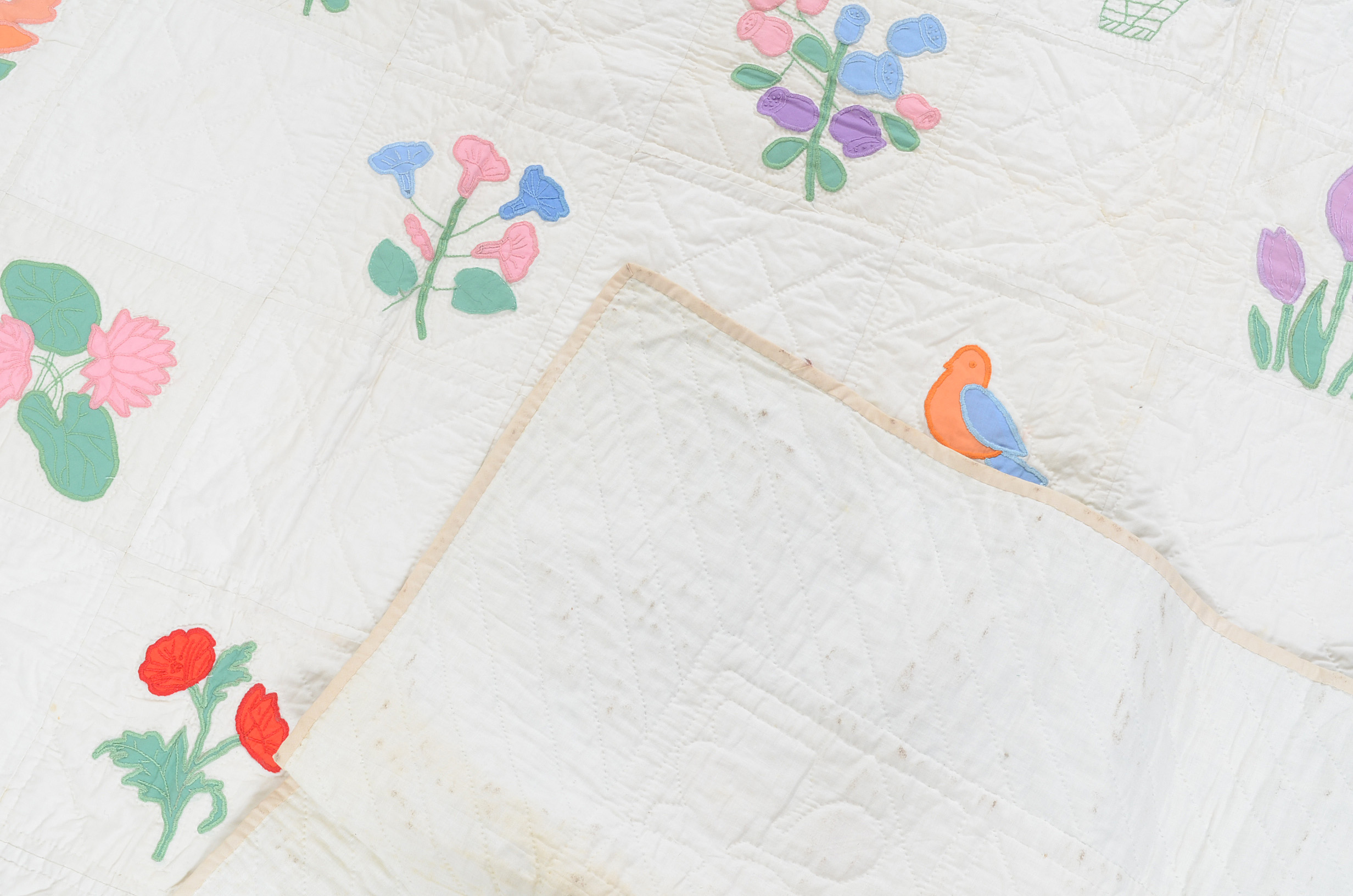 Hand-stitched Applique Quilts