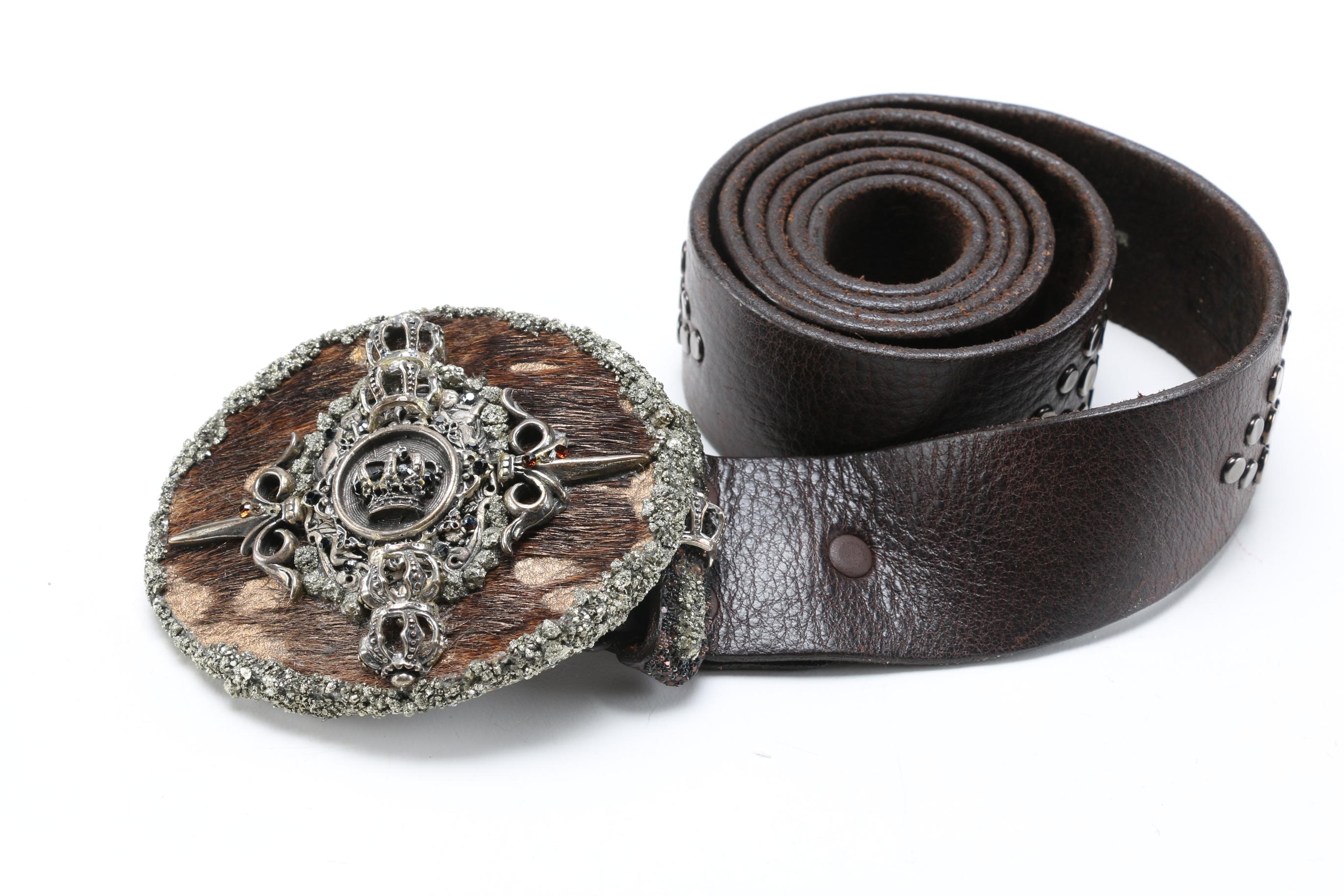 Men's Accessories Including a Leather Belt and Several Belt Buckles