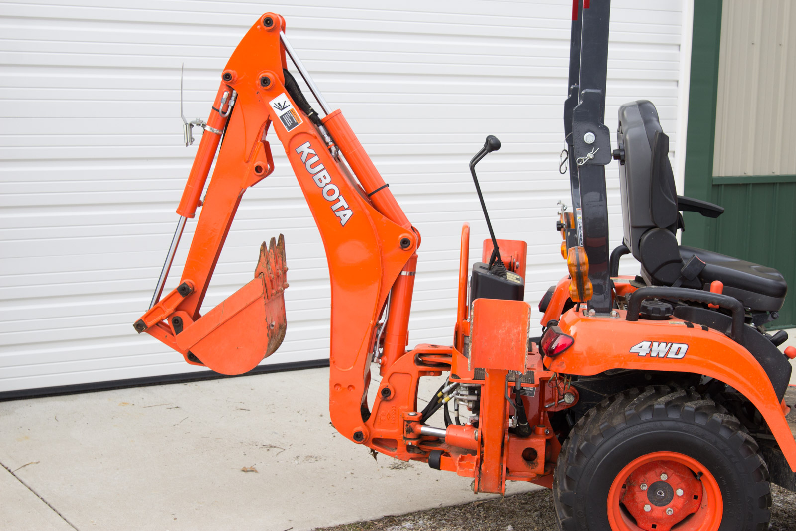 Kubota BX25DLB Tractor with Loader and Backhoe Attachments