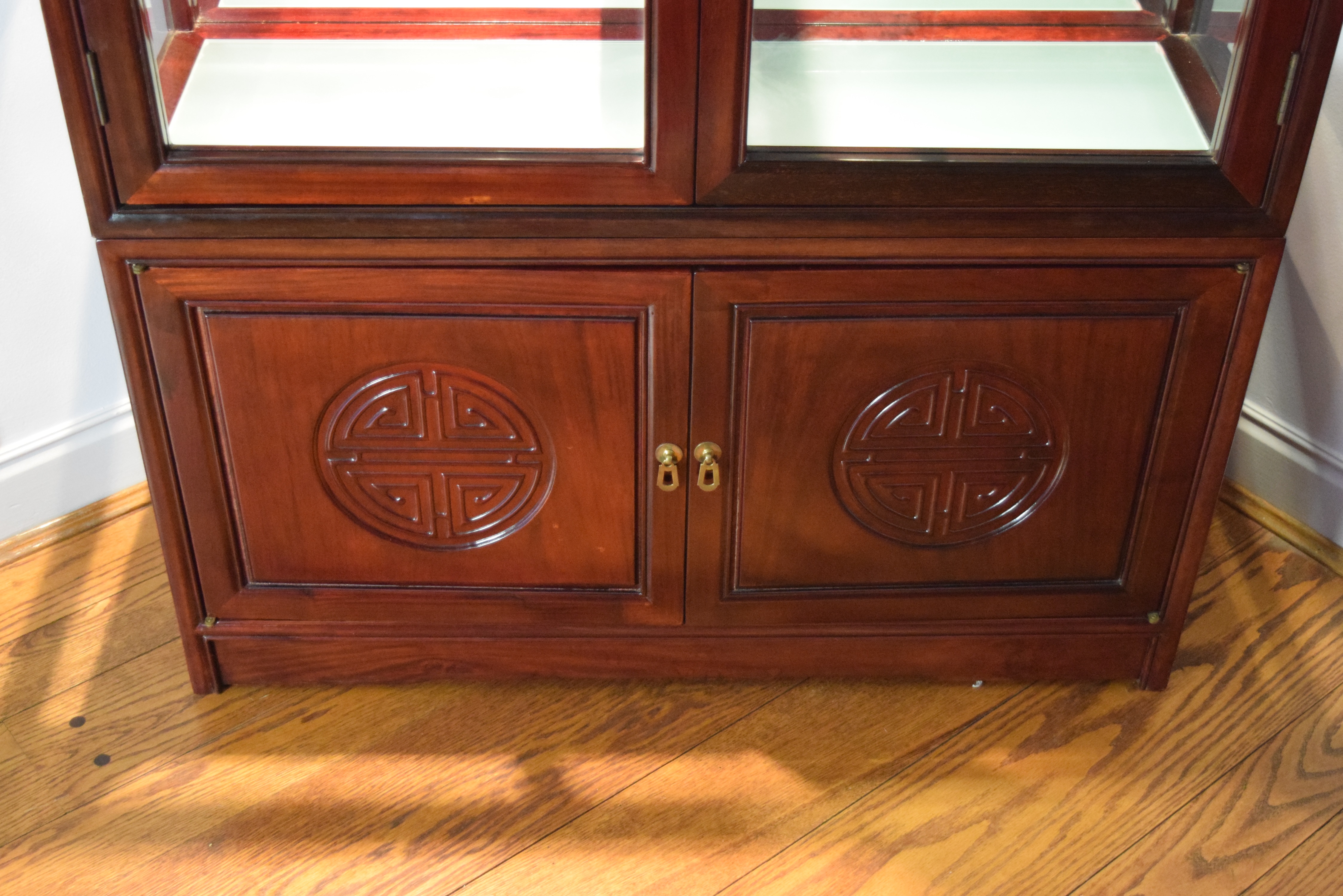 Asian Inspired Curio Cabinet with Stepped Shelving