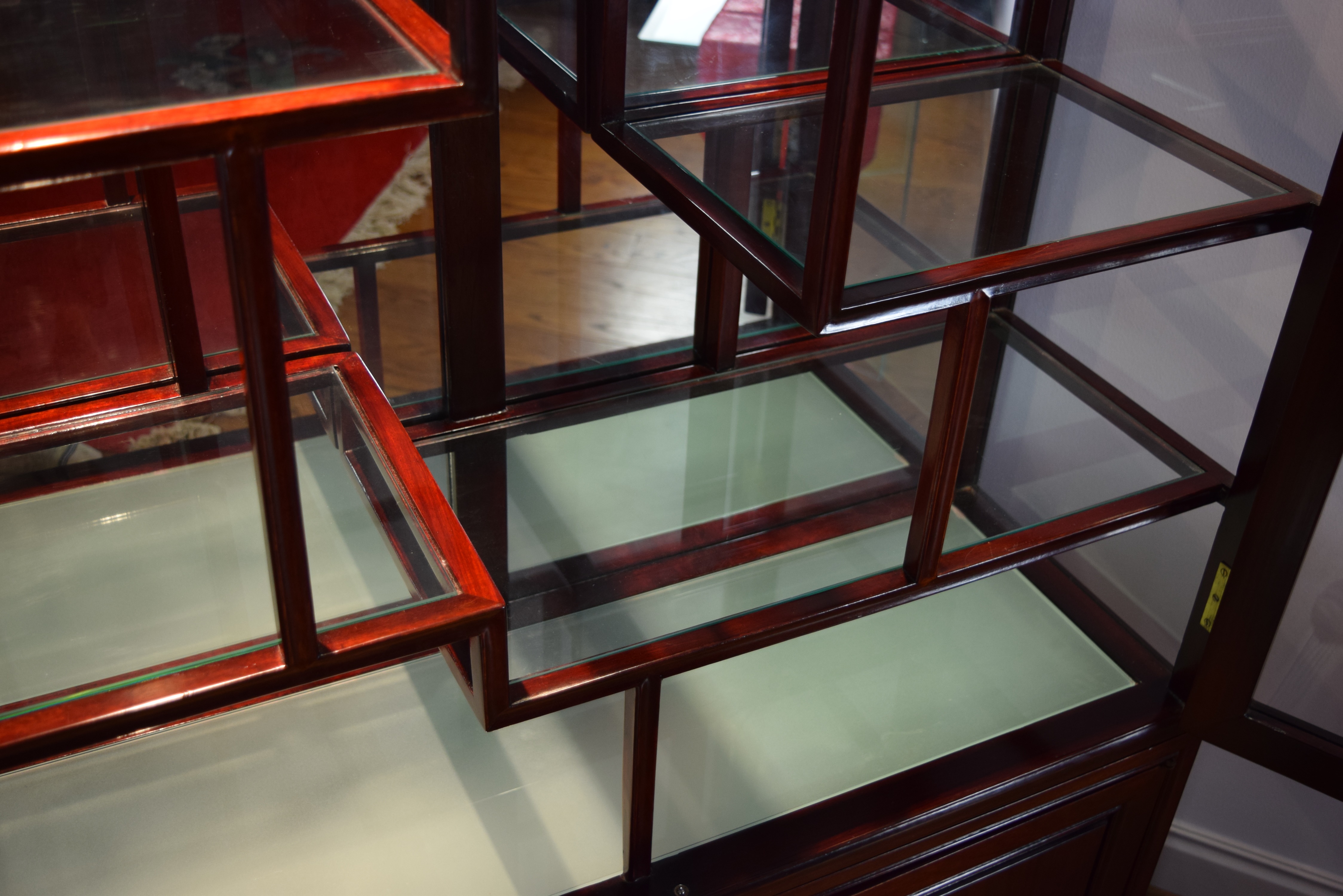 Asian Inspired Curio Cabinet with Stepped Shelving