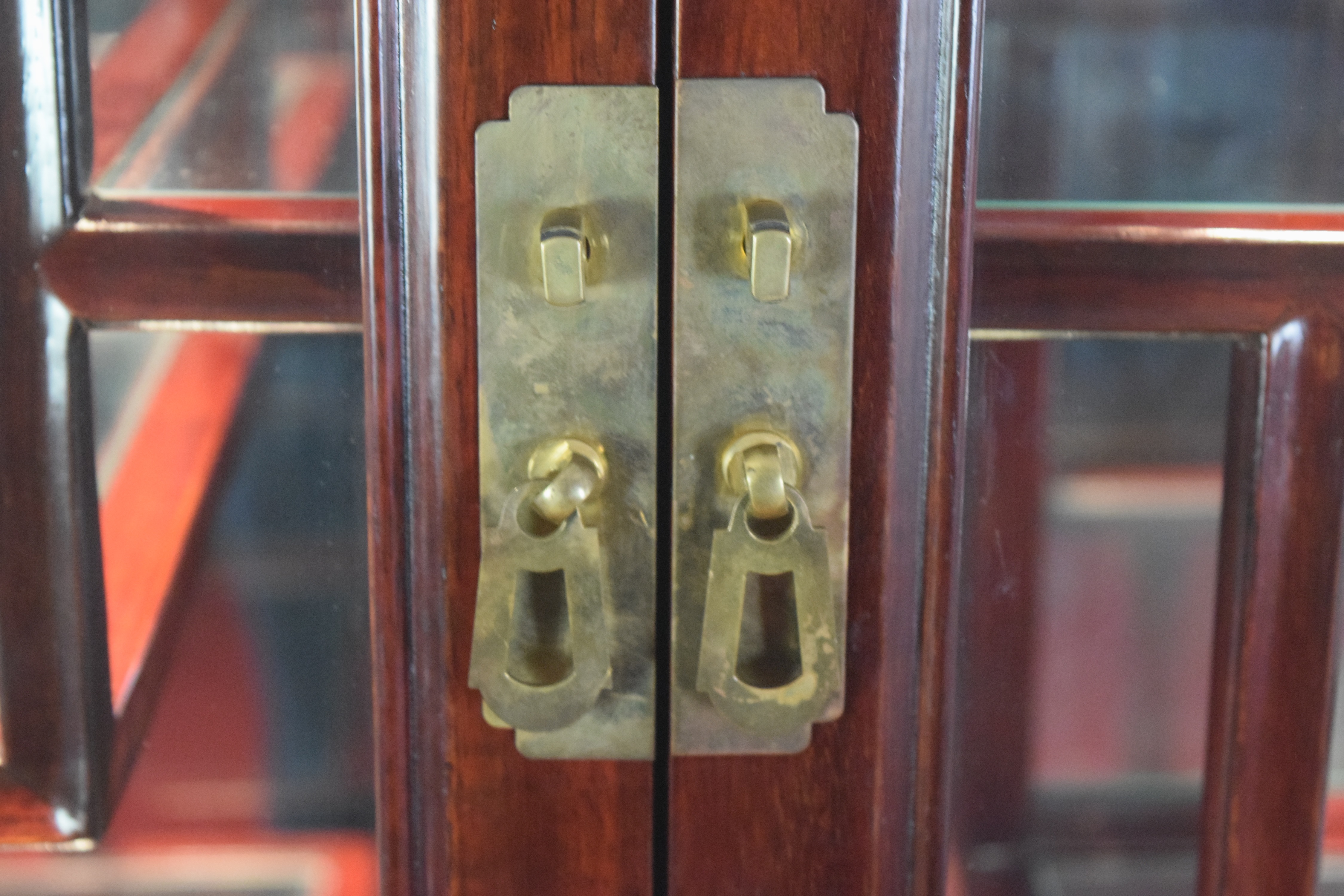 Asian Inspired Curio Cabinet with Stepped Shelving