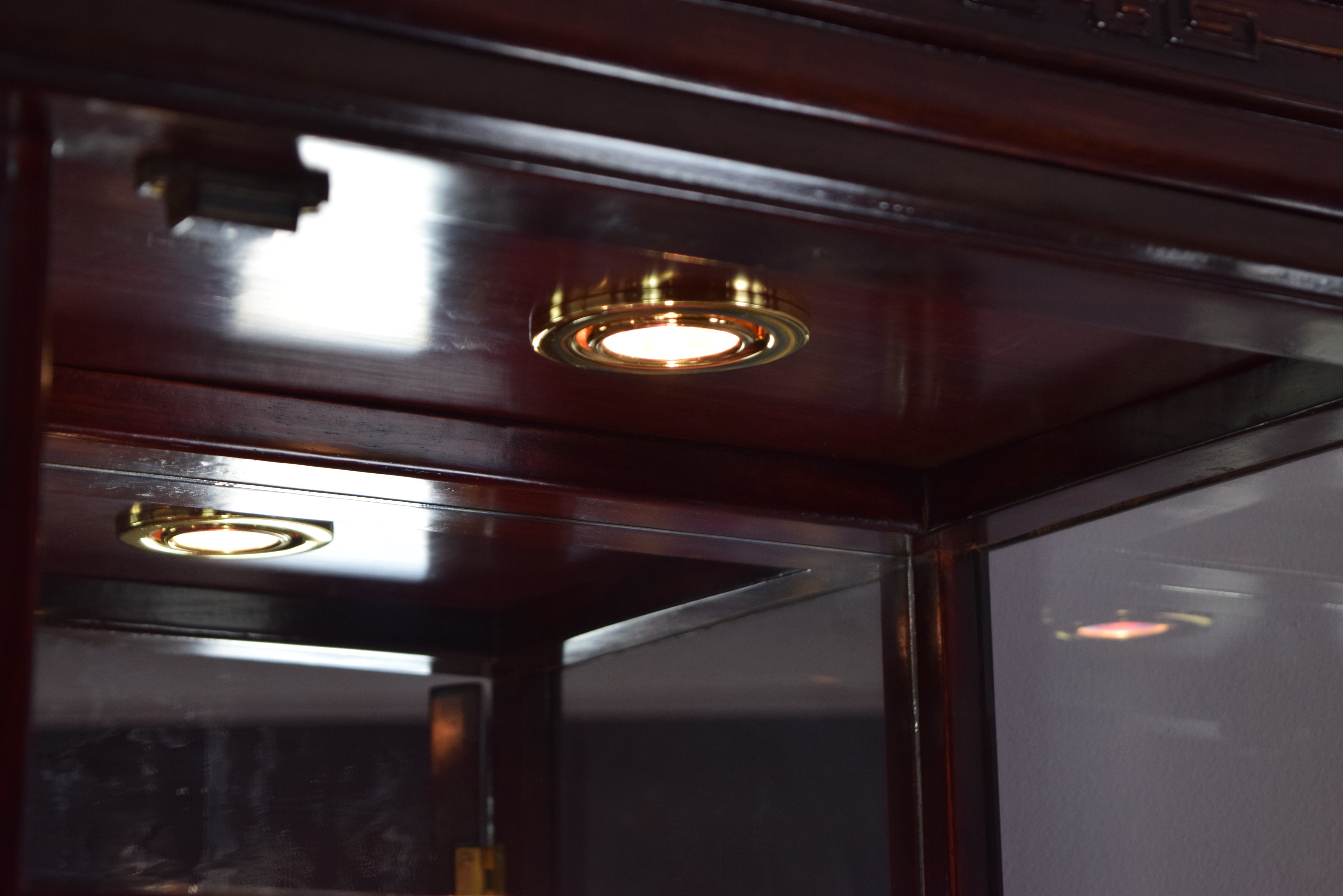 Asian Inspired Curio Cabinet with Stepped Shelving