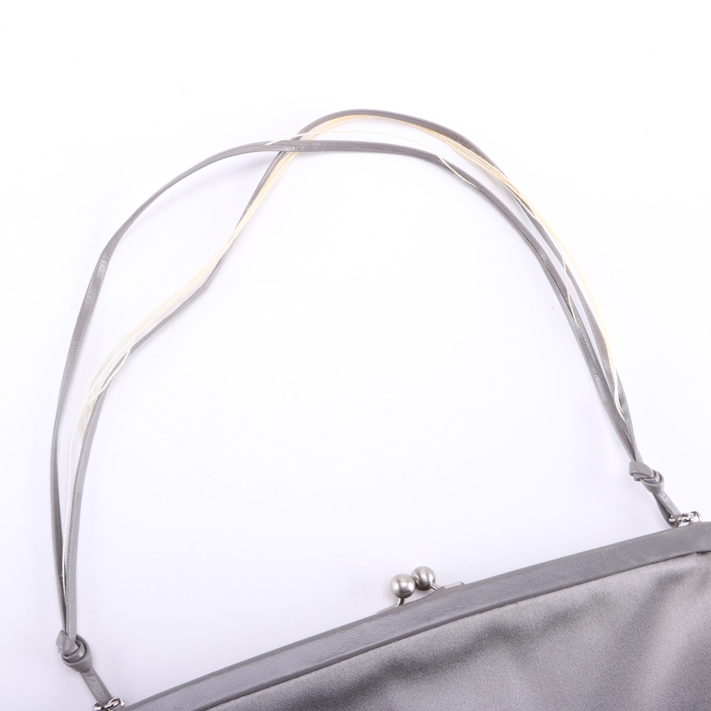 Yves Saint Laurent and Prada Handbags