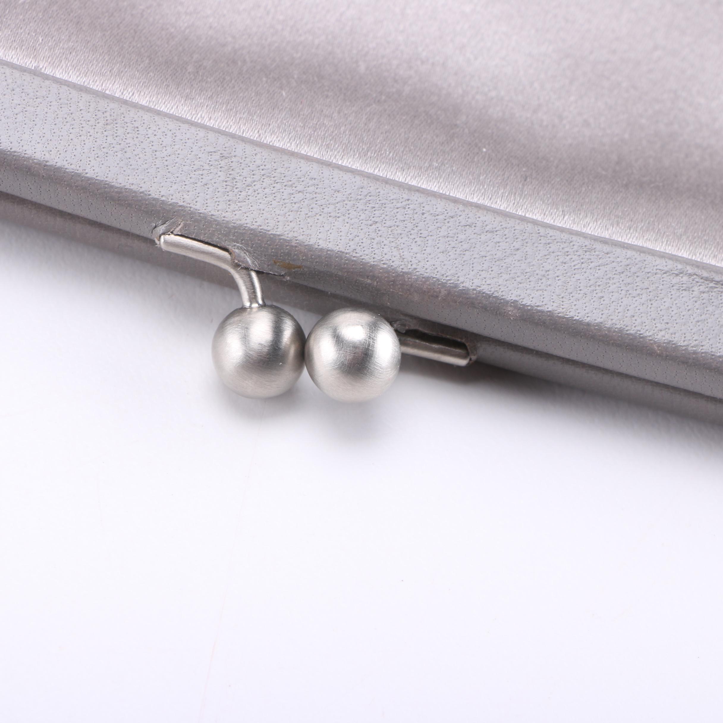 Yves Saint Laurent and Prada Handbags