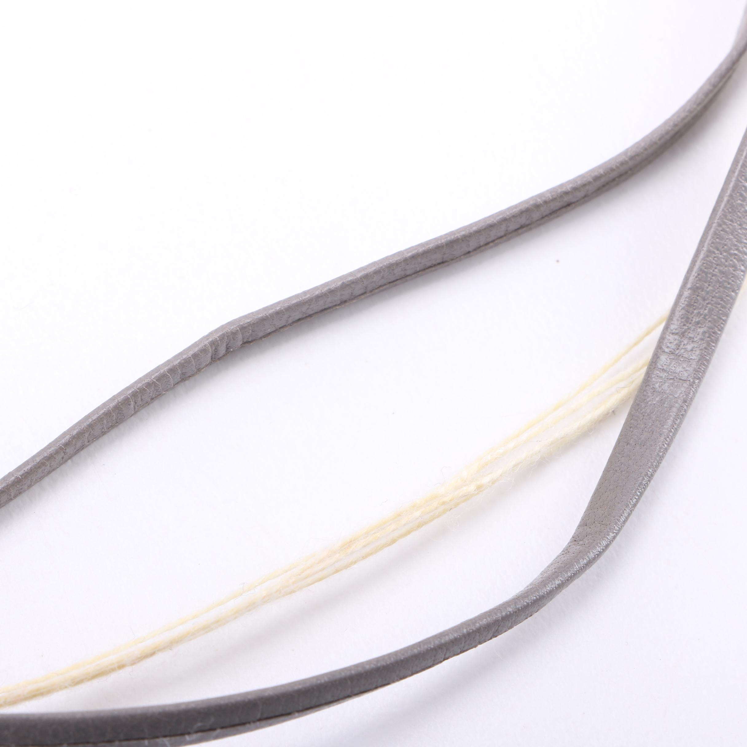 Yves Saint Laurent and Prada Handbags