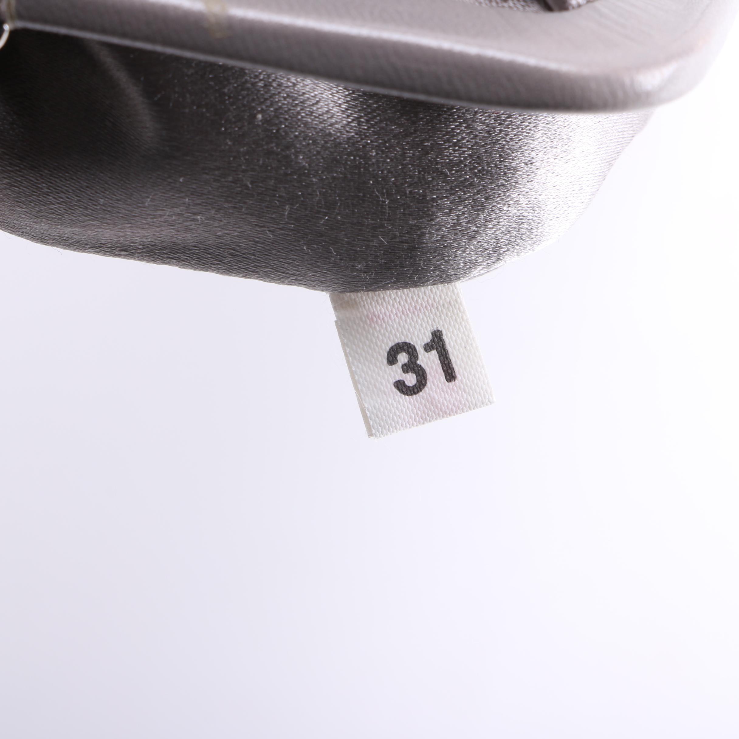 Yves Saint Laurent and Prada Handbags