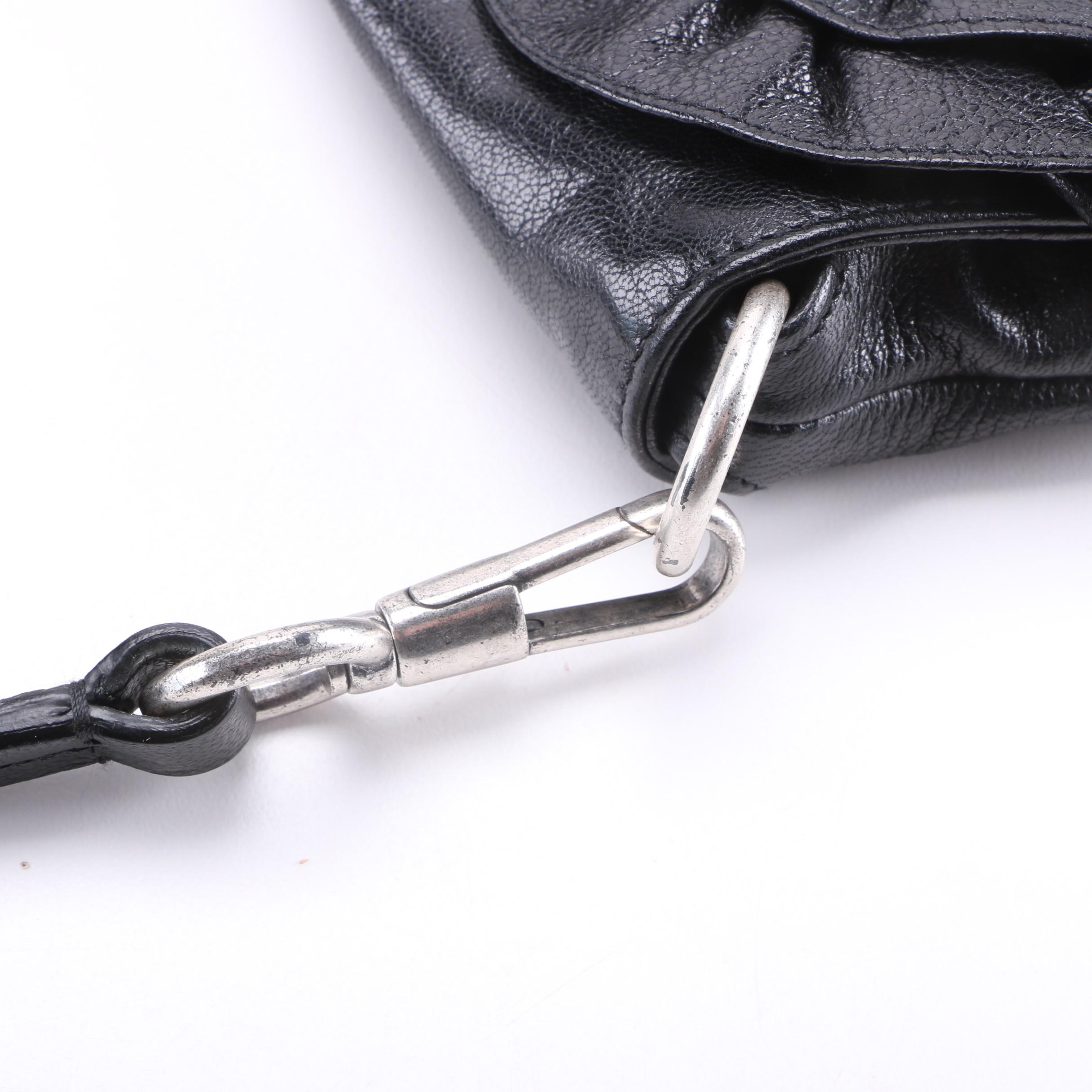 Yves Saint Laurent and Prada Handbags