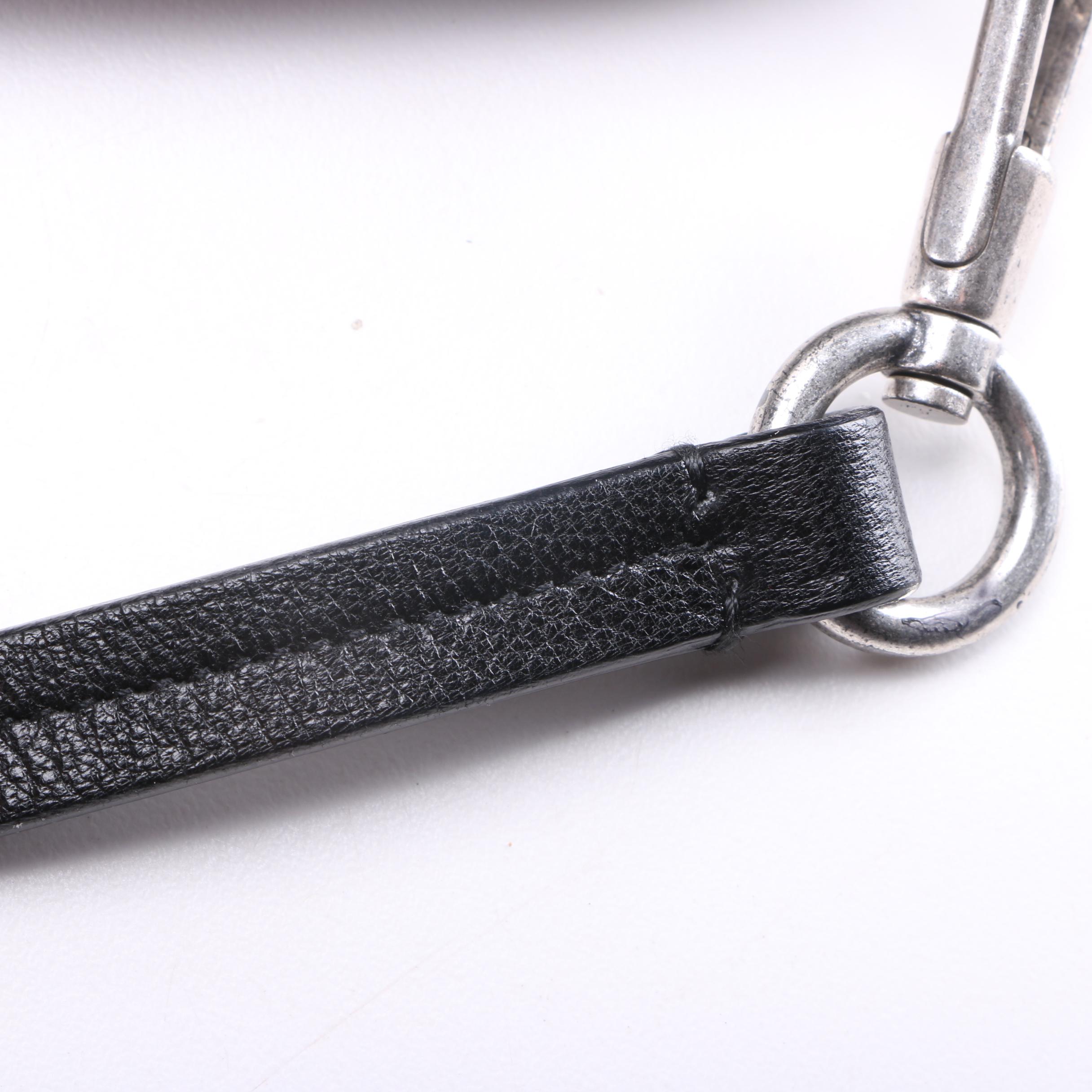 Yves Saint Laurent and Prada Handbags