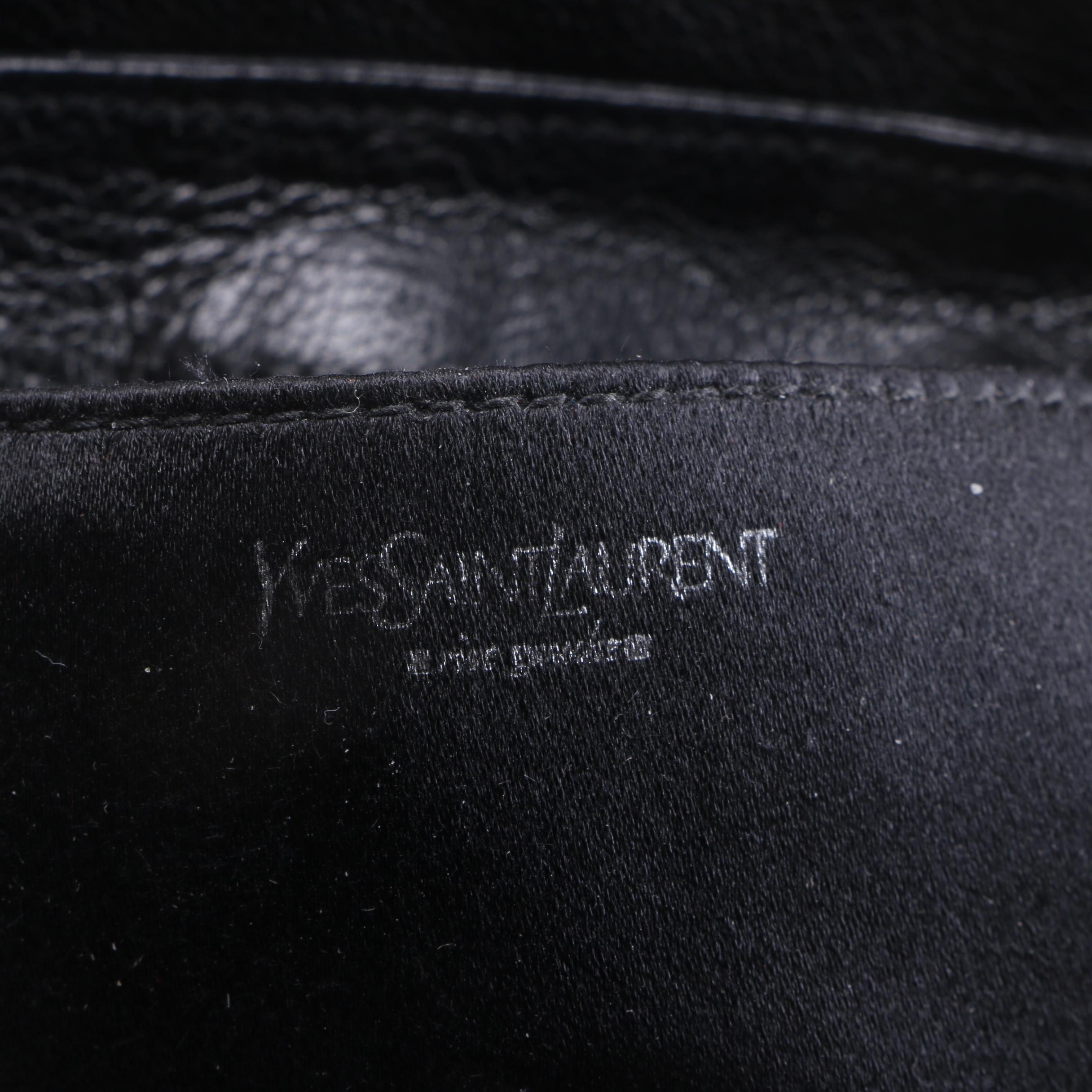 Yves Saint Laurent and Prada Handbags