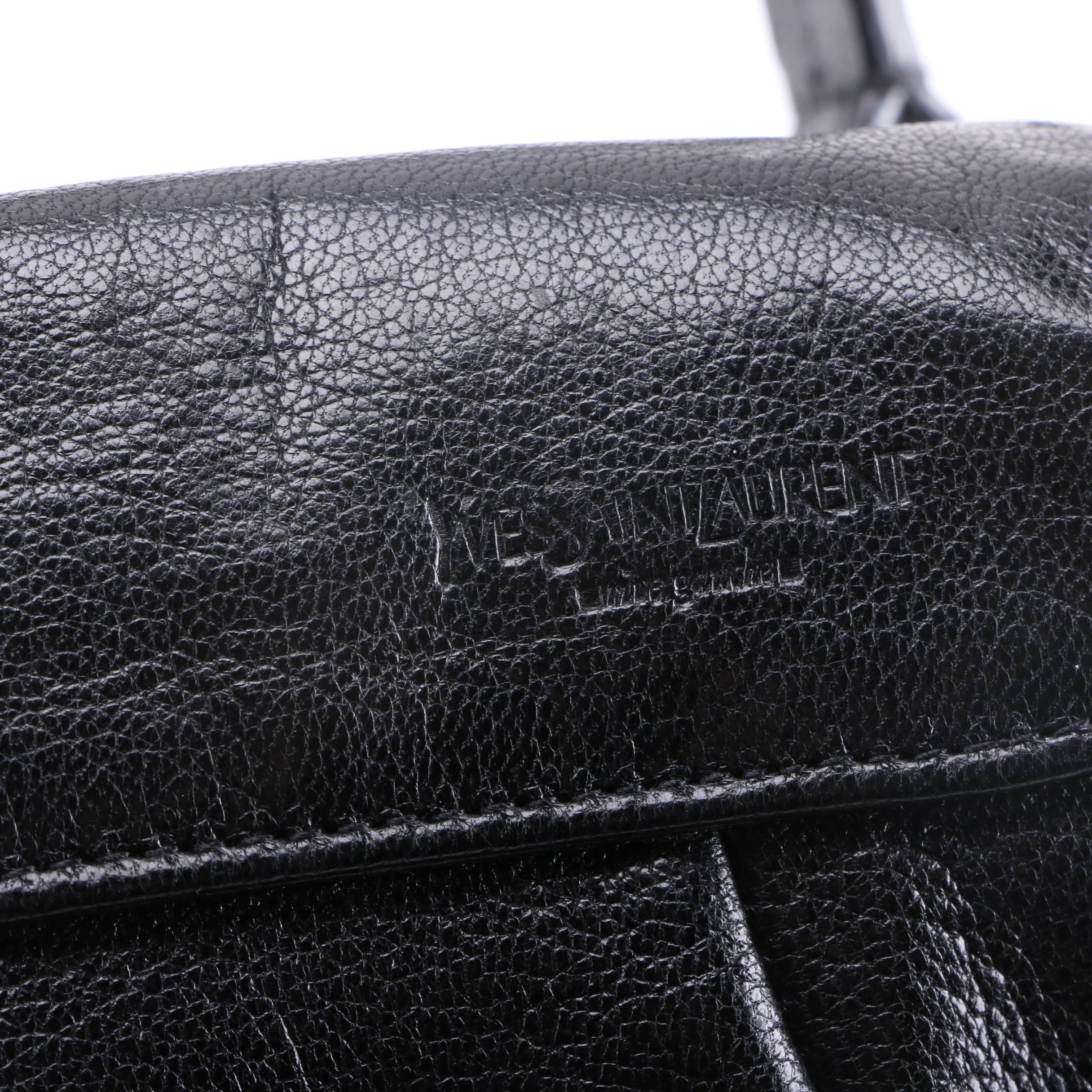 Yves Saint Laurent and Prada Handbags