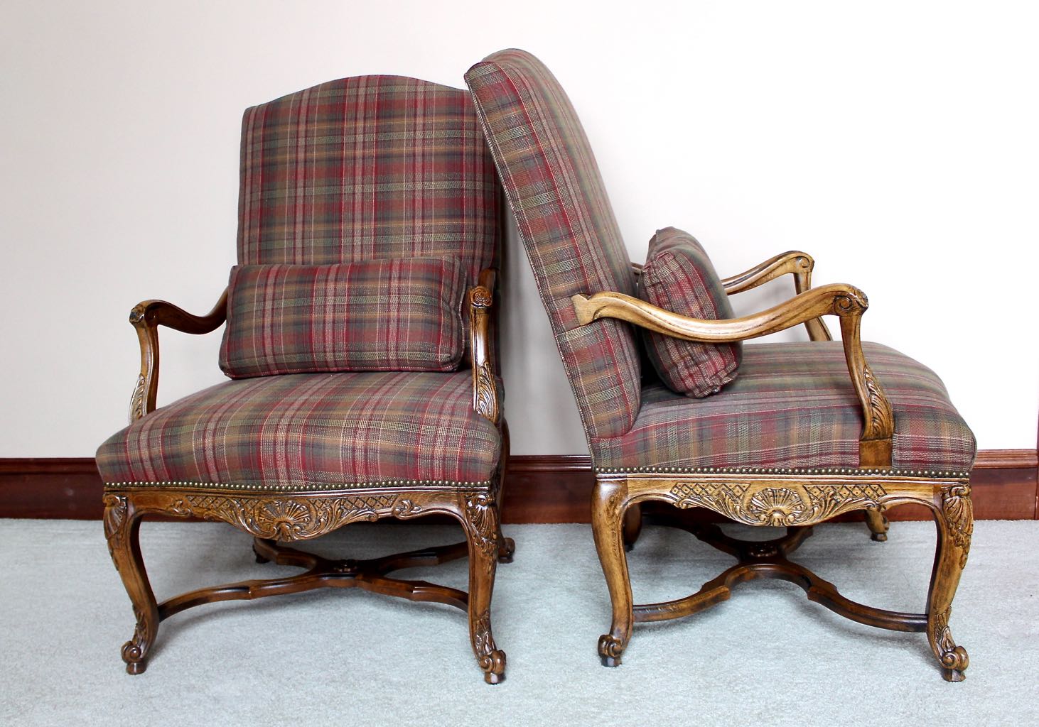 Two Traditional Style Wood Upholstered High Back Arm Chairs