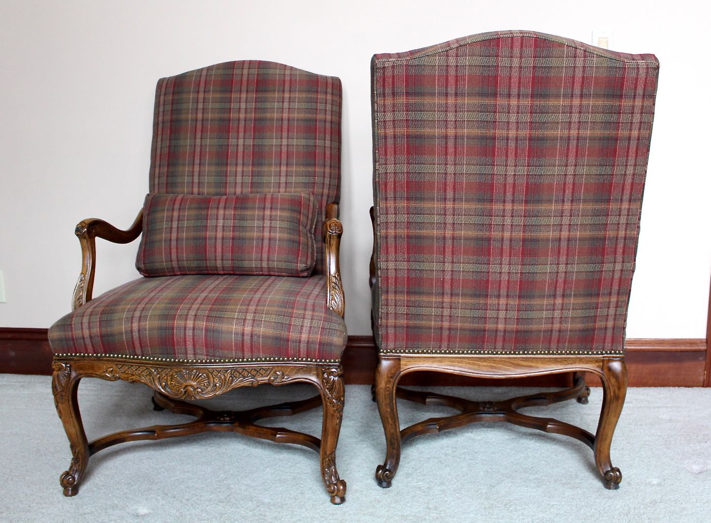 Two Traditional Style Wood Upholstered High Back Arm Chairs