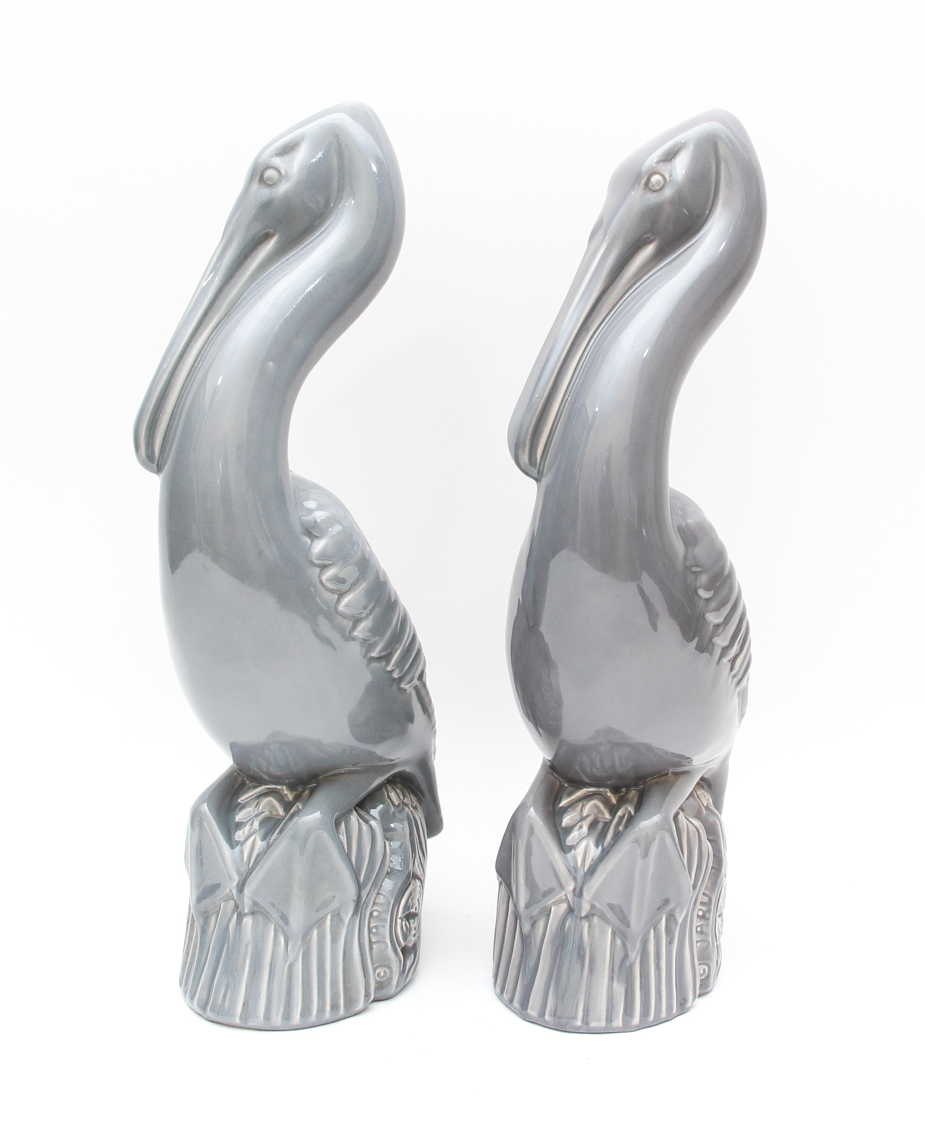 Pair of Large Jaru Pottery Bird Mantle Sculptures