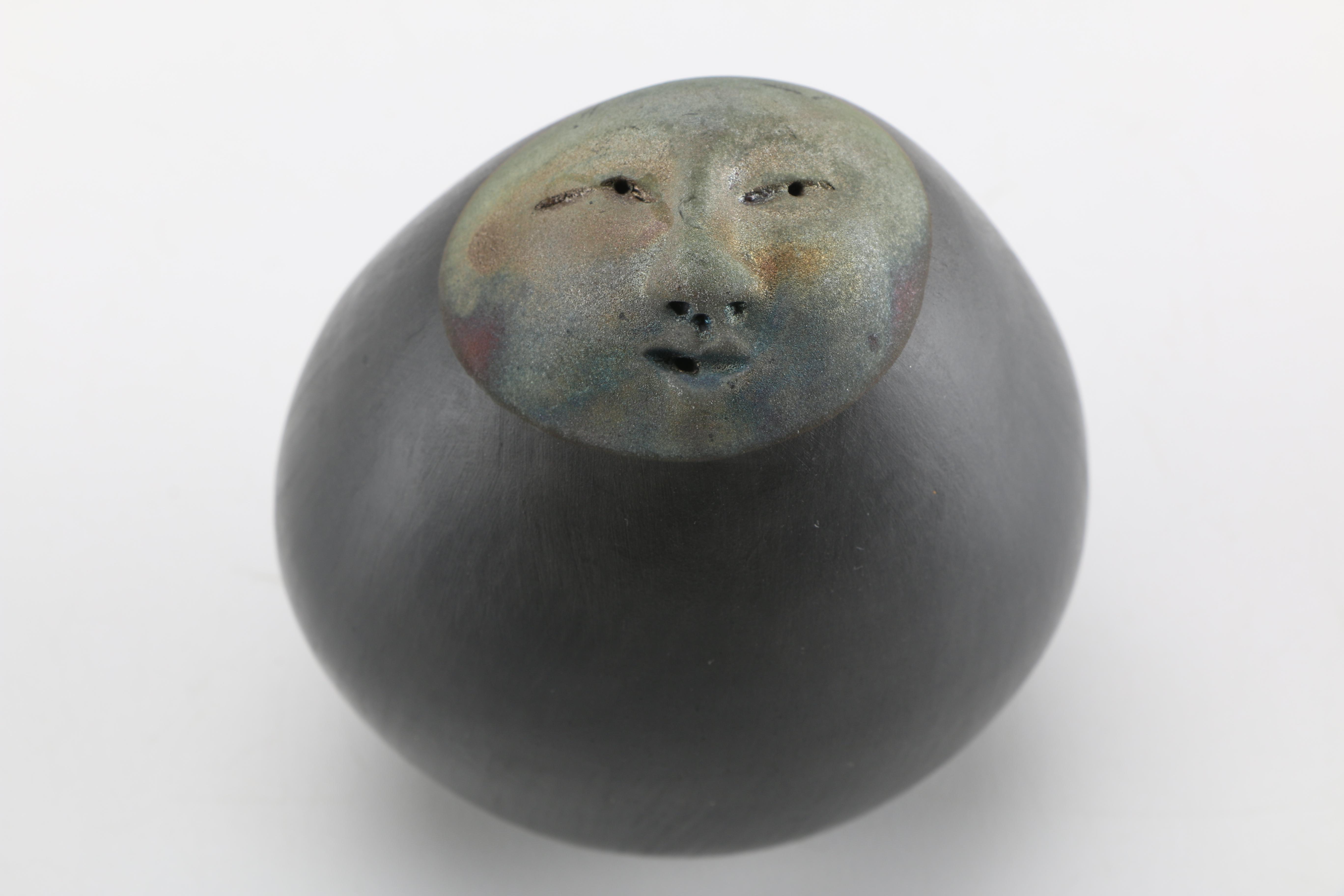 Round Clay Artisan Figurine