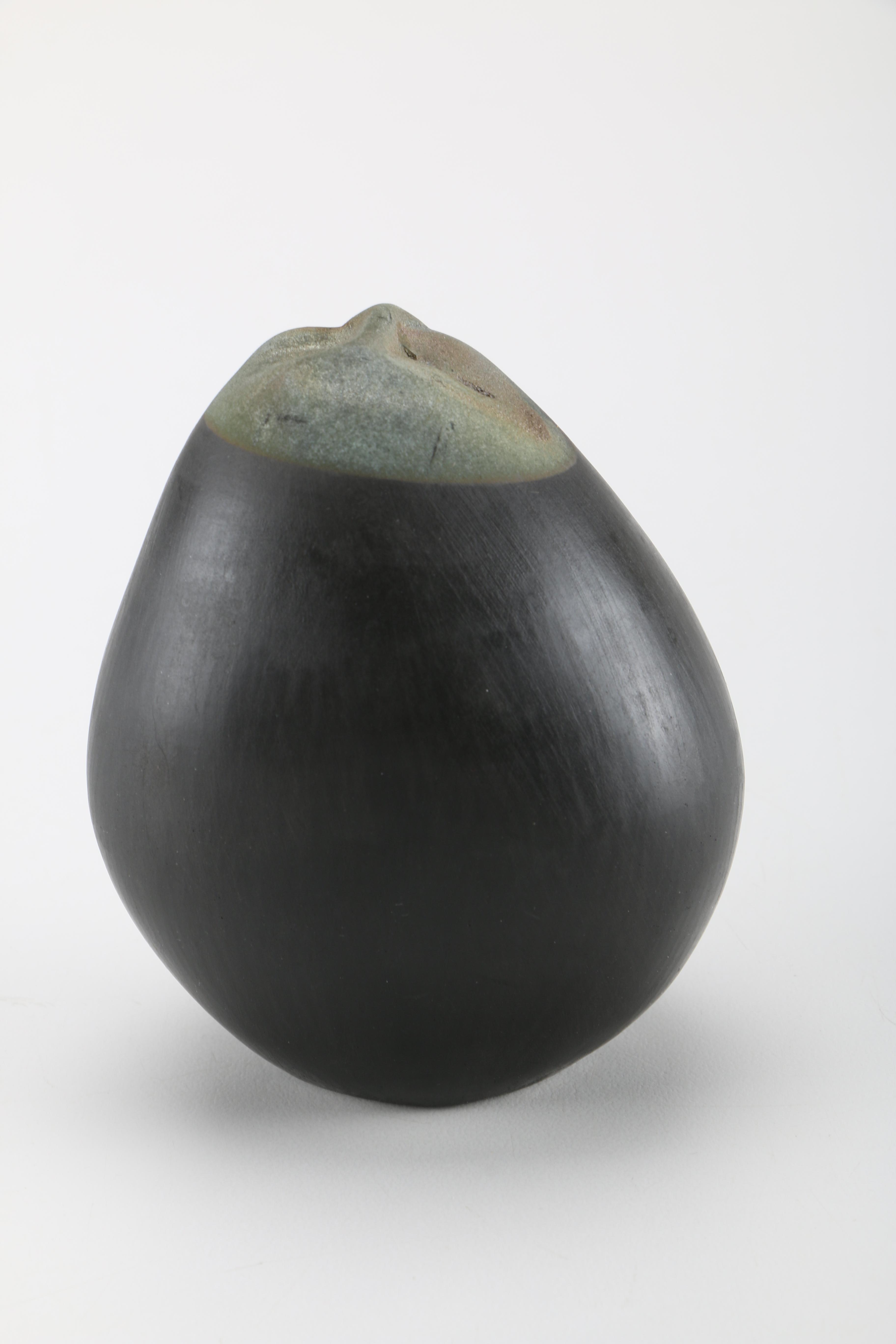 Round Clay Artisan Figurine