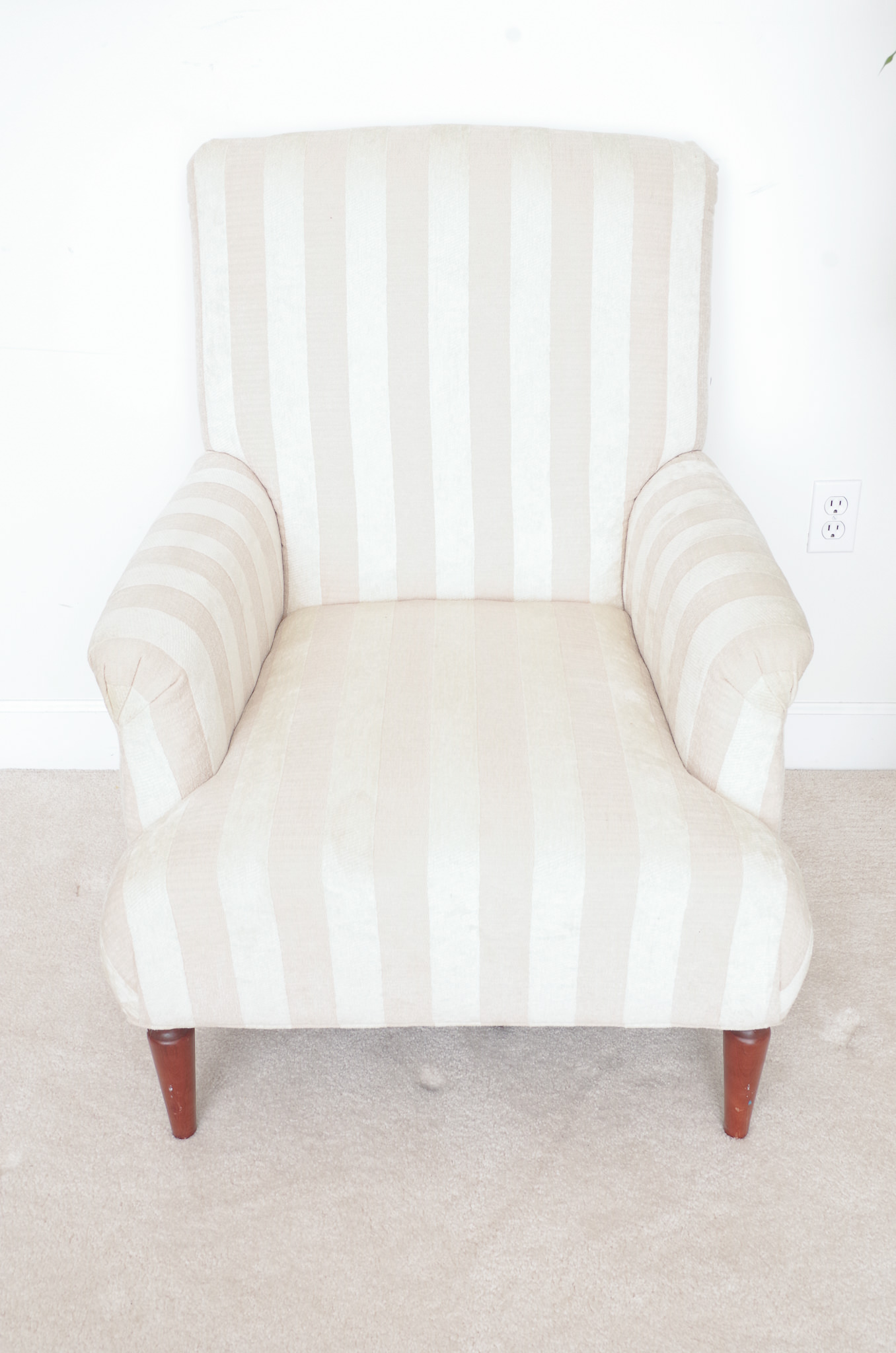 Cushioned and Upholstered Armchair