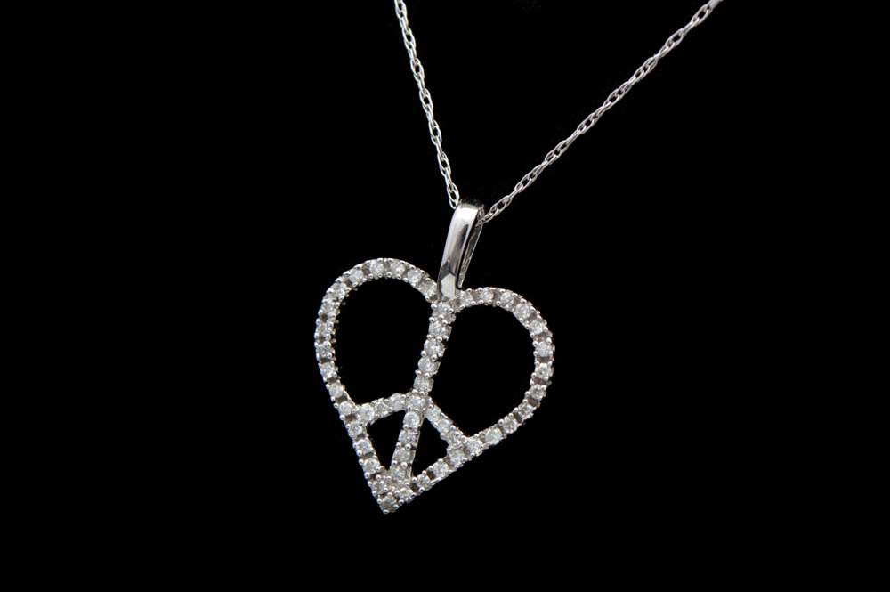 0.20 CTW Diamond and 10K White Gold Heart Peace Pendant with Chain