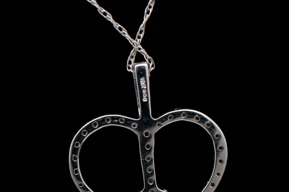 0.20 CTW Diamond and 10K White Gold Heart Peace Pendant with Chain