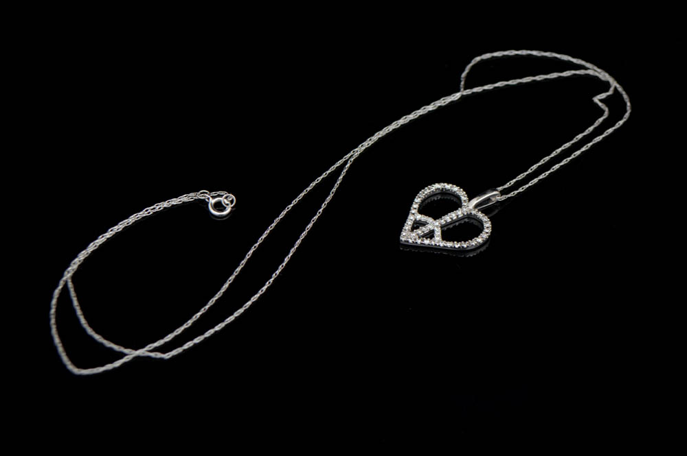 0.20 CTW Diamond and 10K White Gold Heart Peace Pendant with Chain