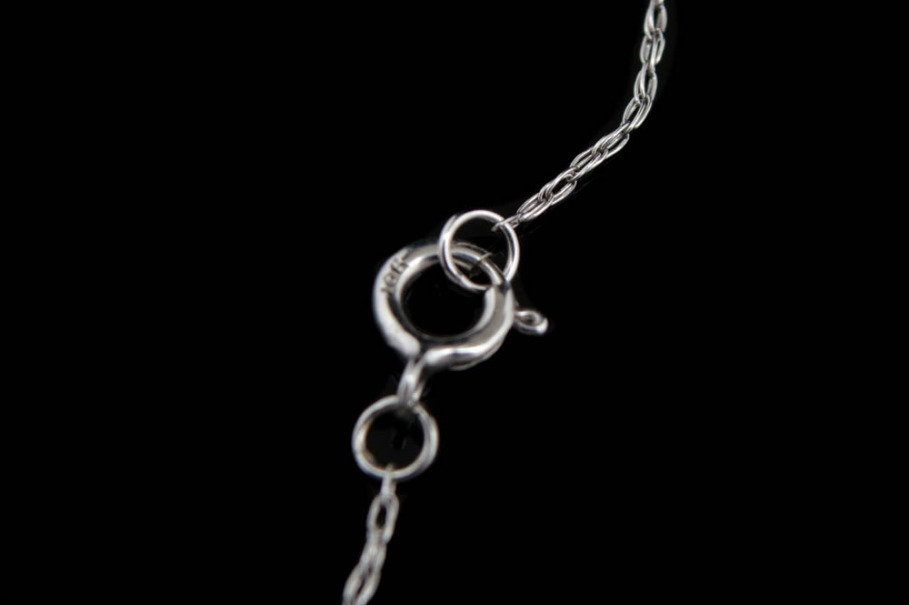 0.20 CTW Diamond and 10K White Gold Heart Peace Pendant with Chain