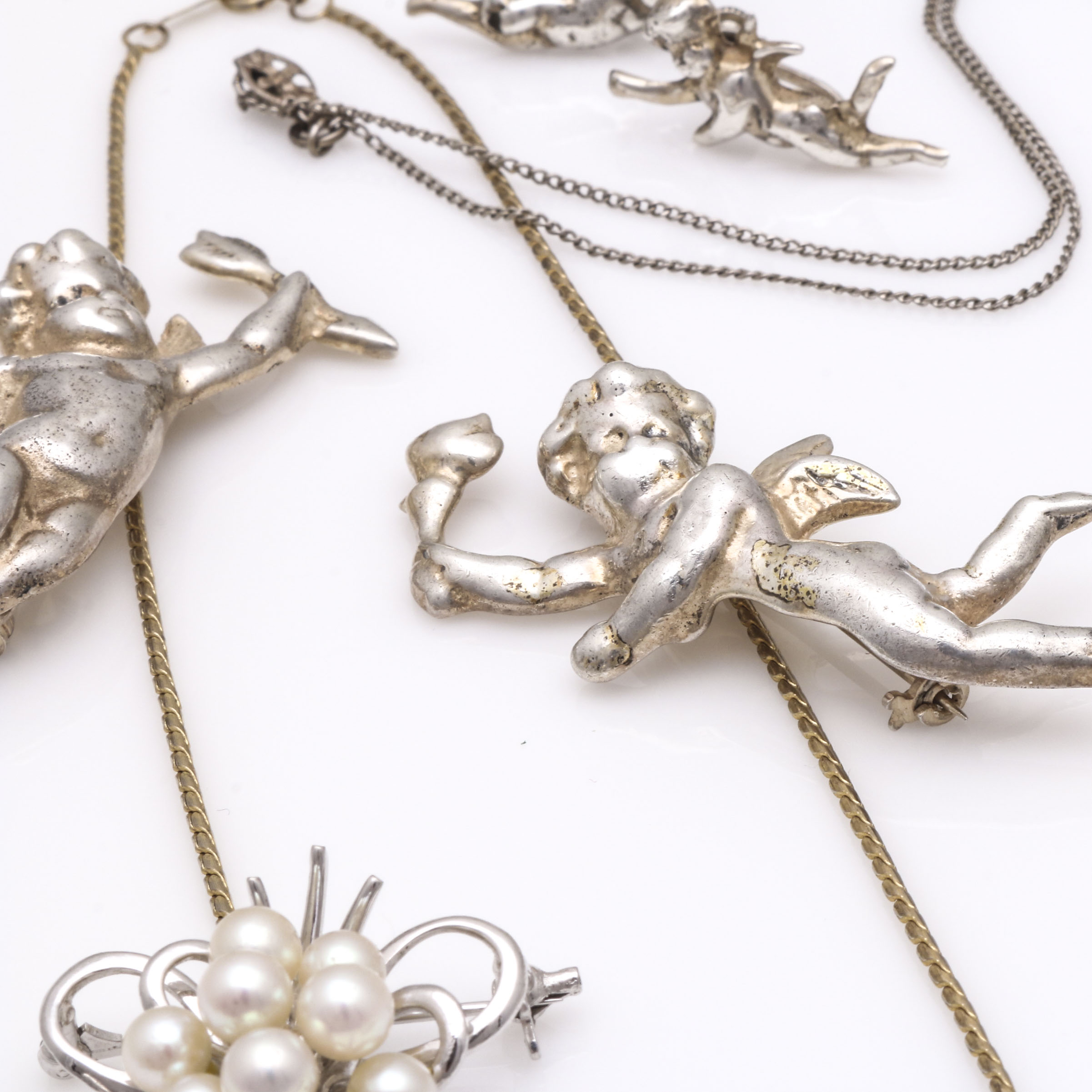 Sterling Silver Earrings, Brooches, and Necklaces