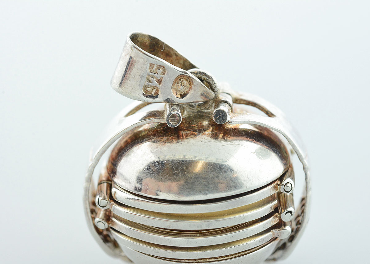 Sterling Silver Collapsible Orb Locket