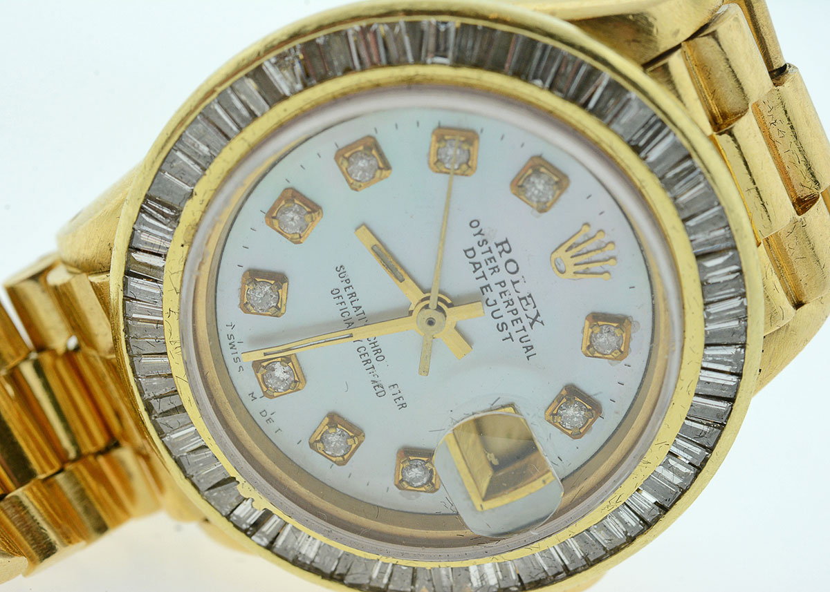 Women's Rolex with Diamond Bezel and Mother-of-Pearl and Diamond Dial
