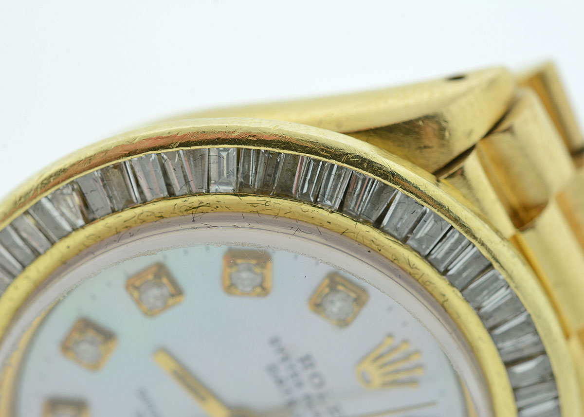 Women's Rolex with Diamond Bezel and Mother-of-Pearl and Diamond Dial