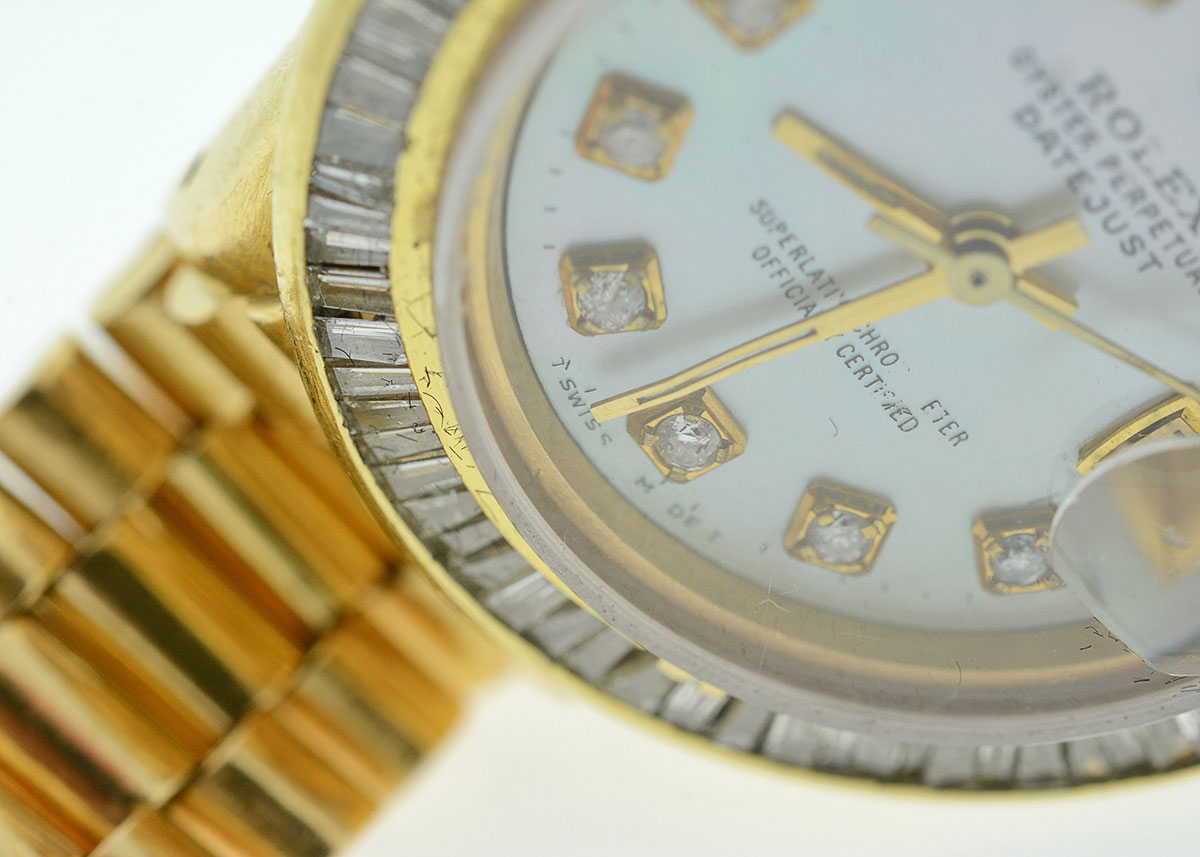 Women's Rolex with Diamond Bezel and Mother-of-Pearl and Diamond Dial