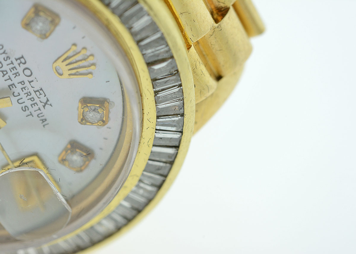 Women's Rolex with Diamond Bezel and Mother-of-Pearl and Diamond Dial