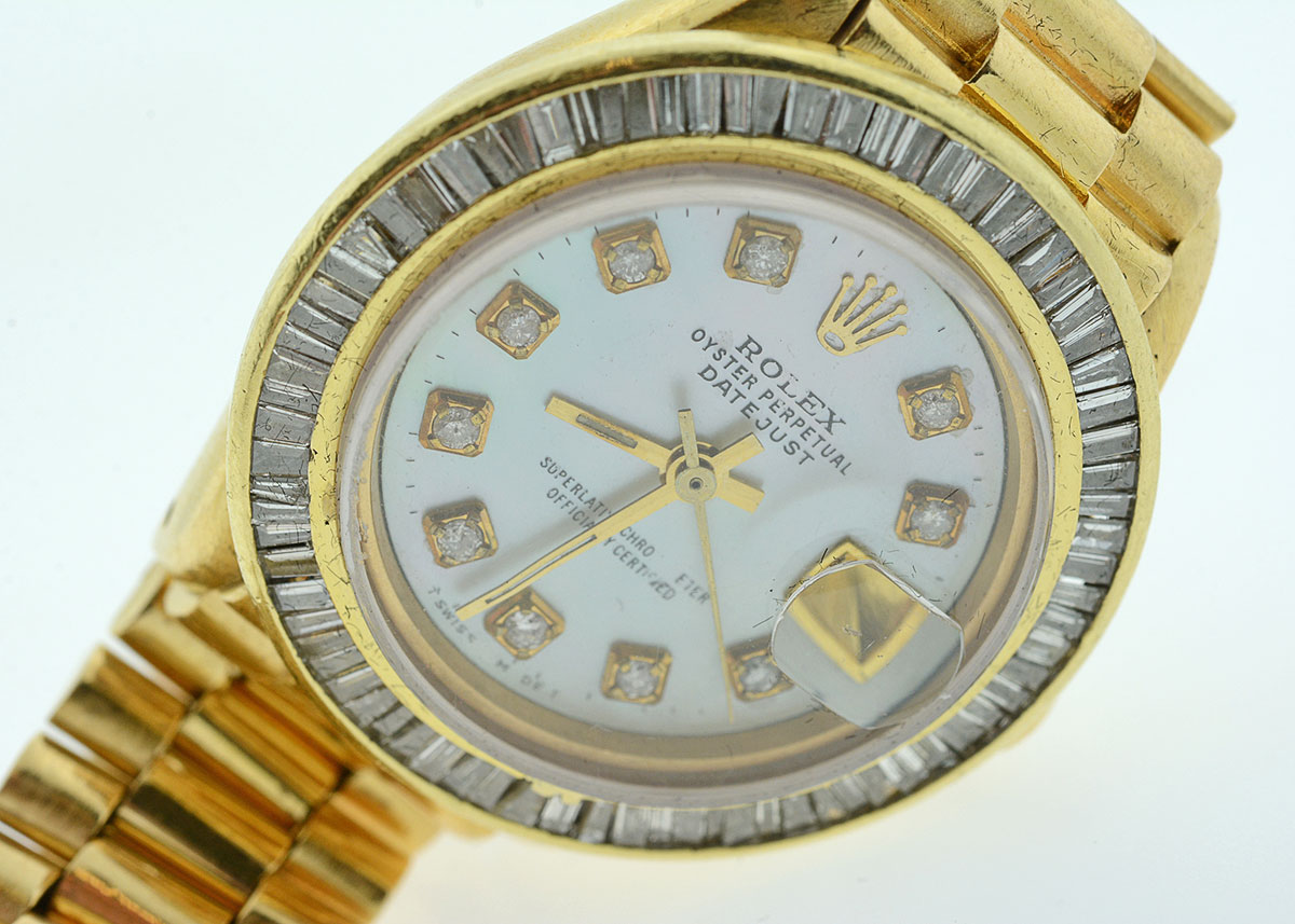 Women's Rolex with Diamond Bezel and Mother-of-Pearl and Diamond Dial